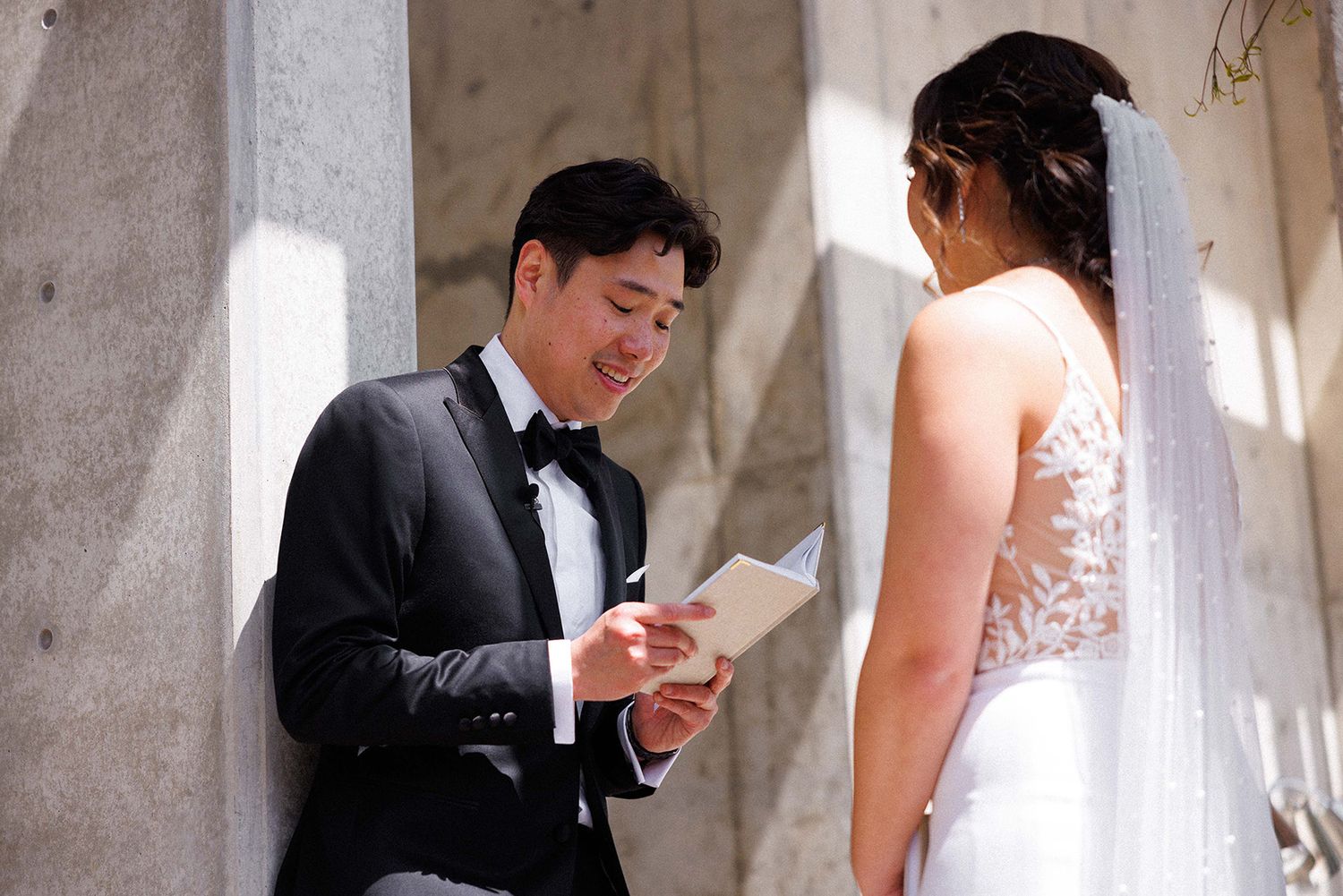 Bride and groom at Amaterra Winery during their first look dressed in formal wedding attire | Portland winery wedding