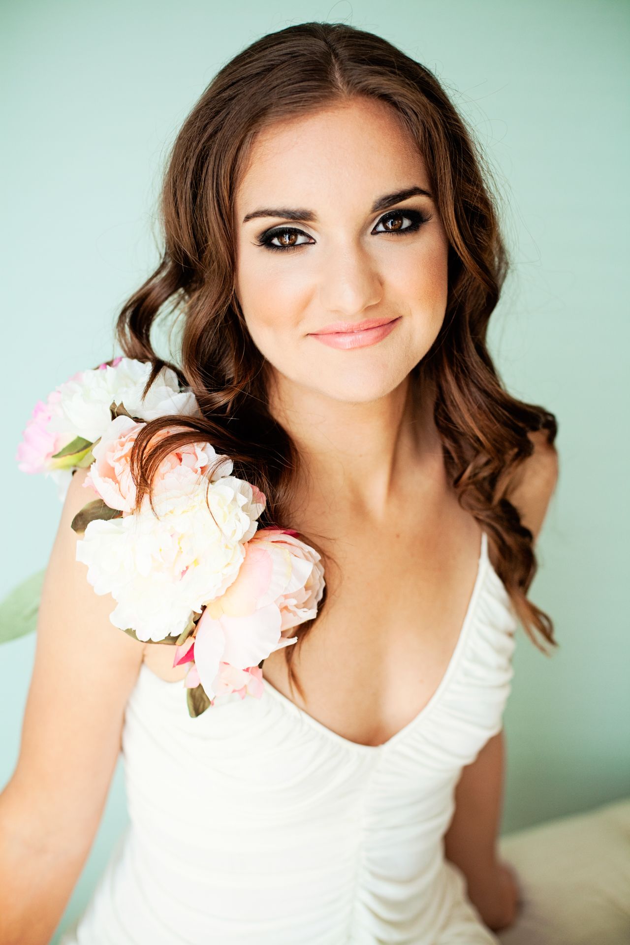 Editorial-style brand photo of woman entrepreneur with soft natural light and neutral background