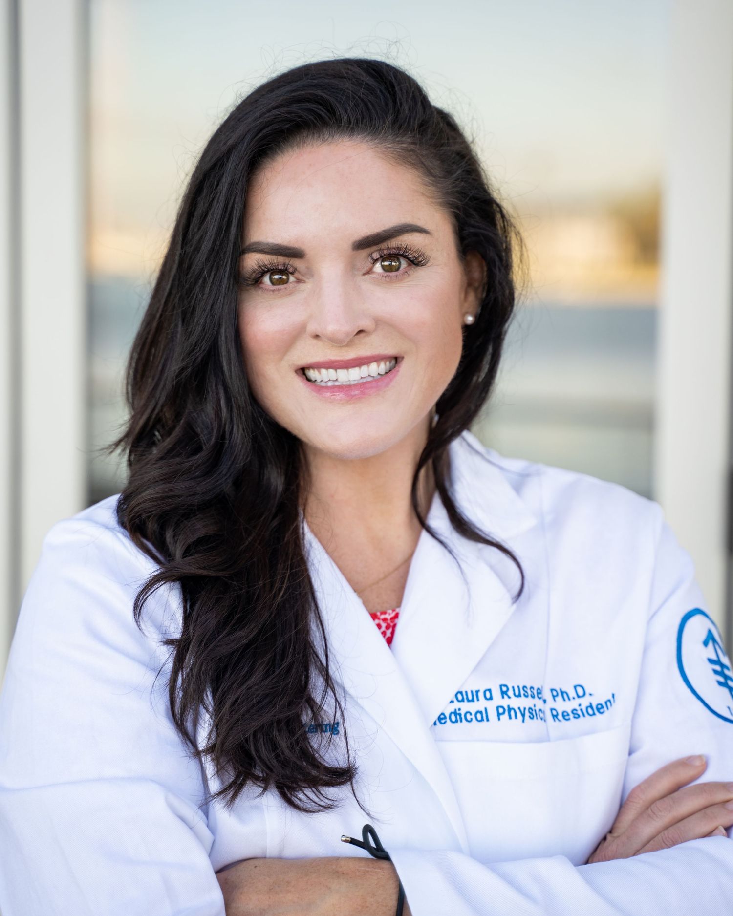 Casual professional headshot of a Southern California medical provider outdoors in natural light