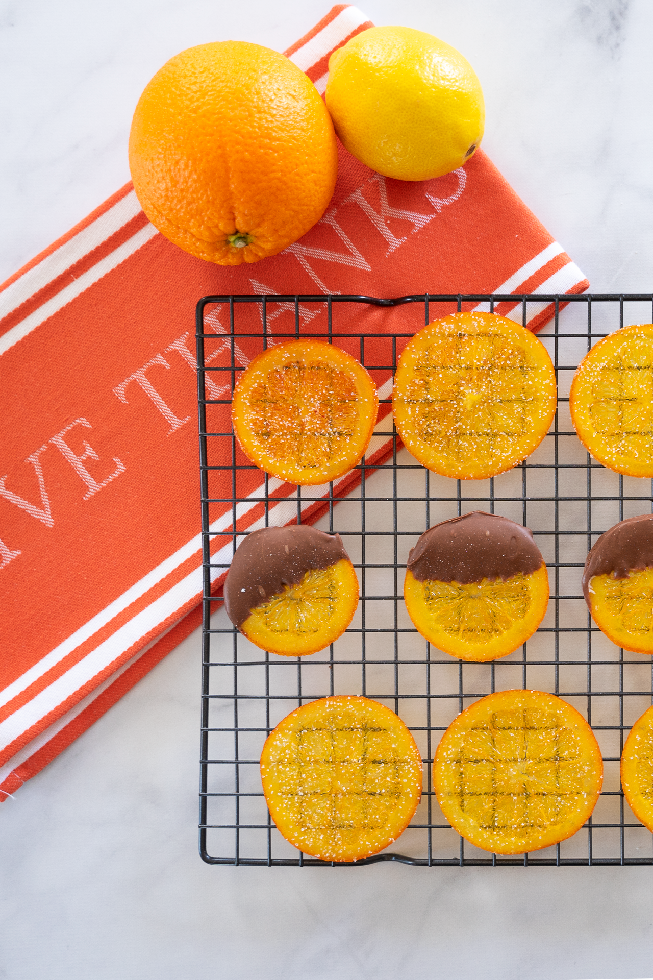 Flat lay of glistening candied orange slices – homemade citrus confection recipe photo