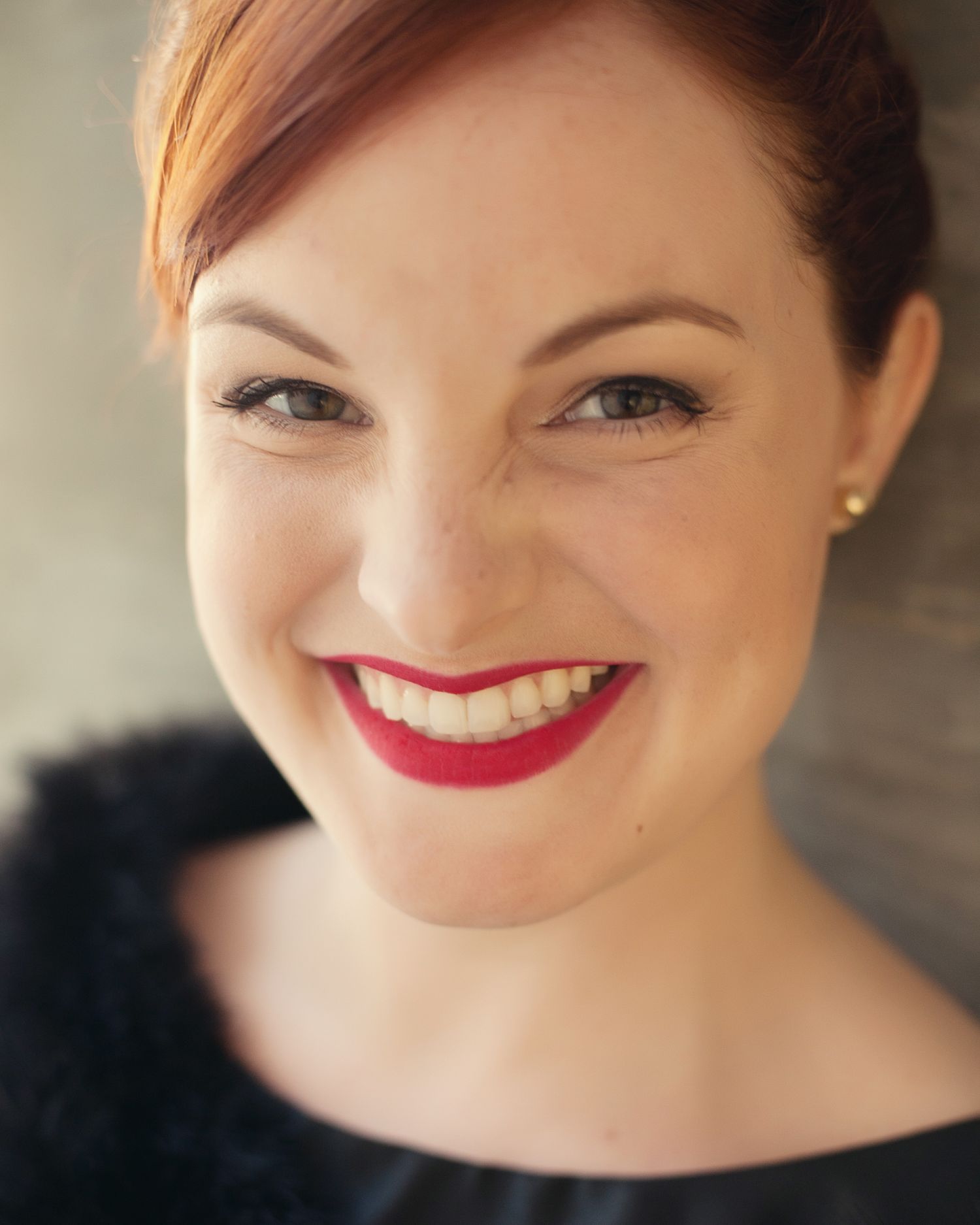 Woman in chic, black dress at brand shoot – modern personal branding photography