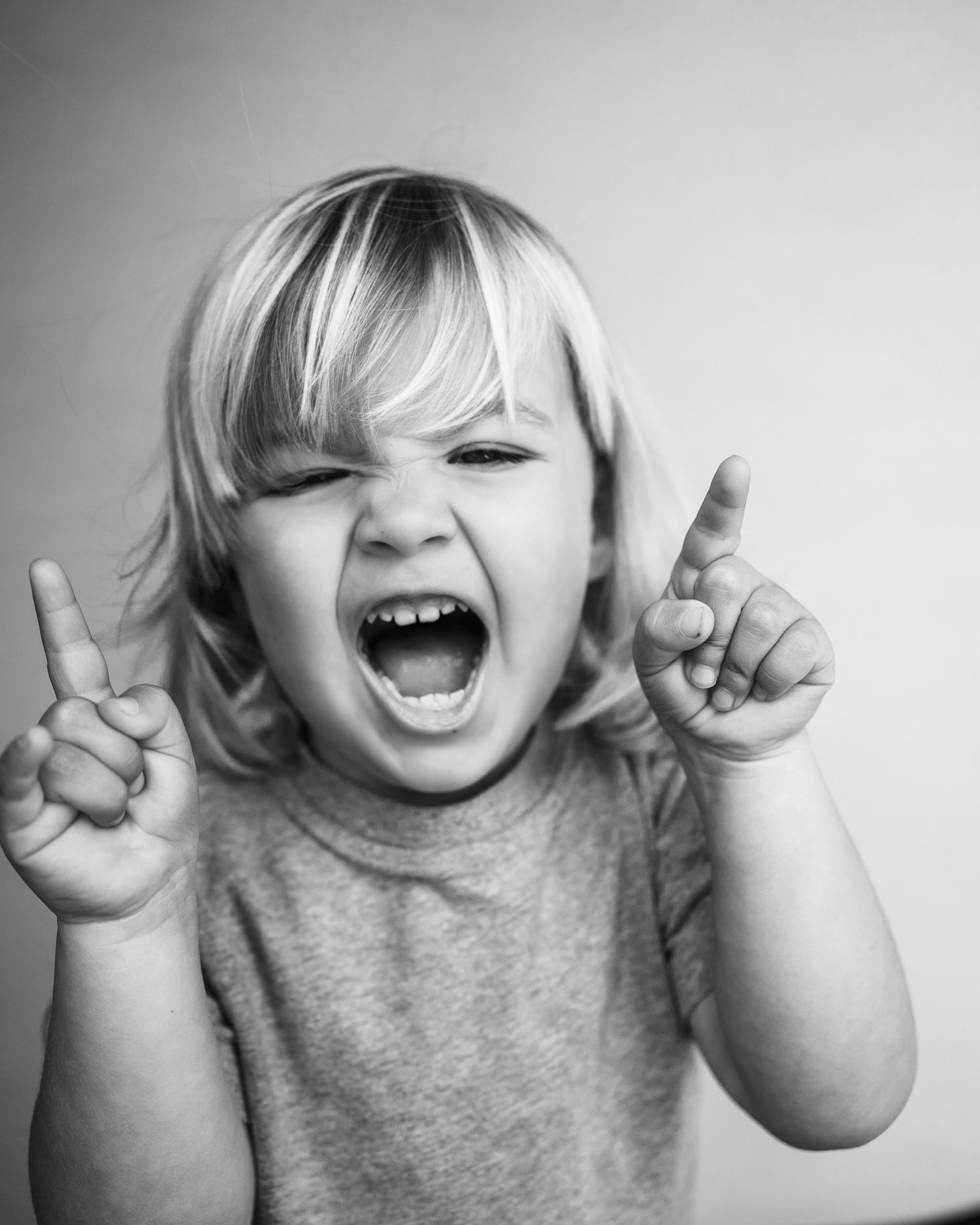 Candid portraits of a boy being himself—playful, expressive, and completely at ease in front of the camera.