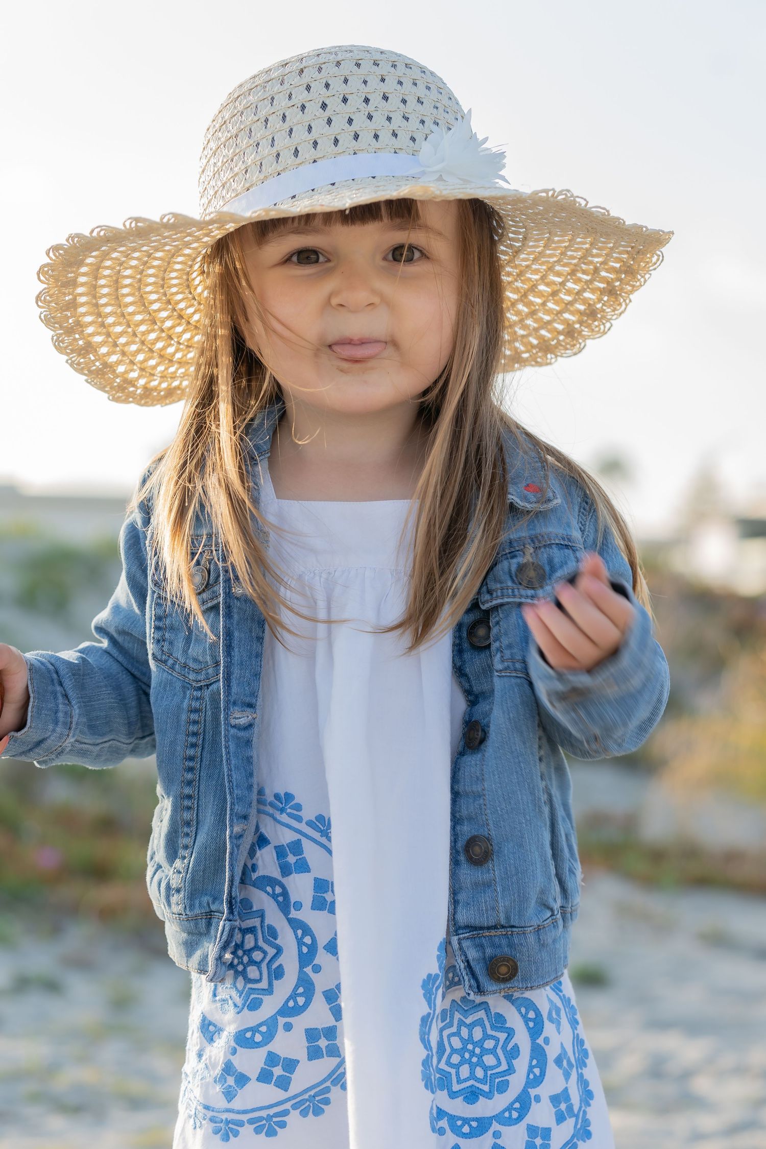 Childhood by the sea—barefoot joy and a straw hat full of wonder