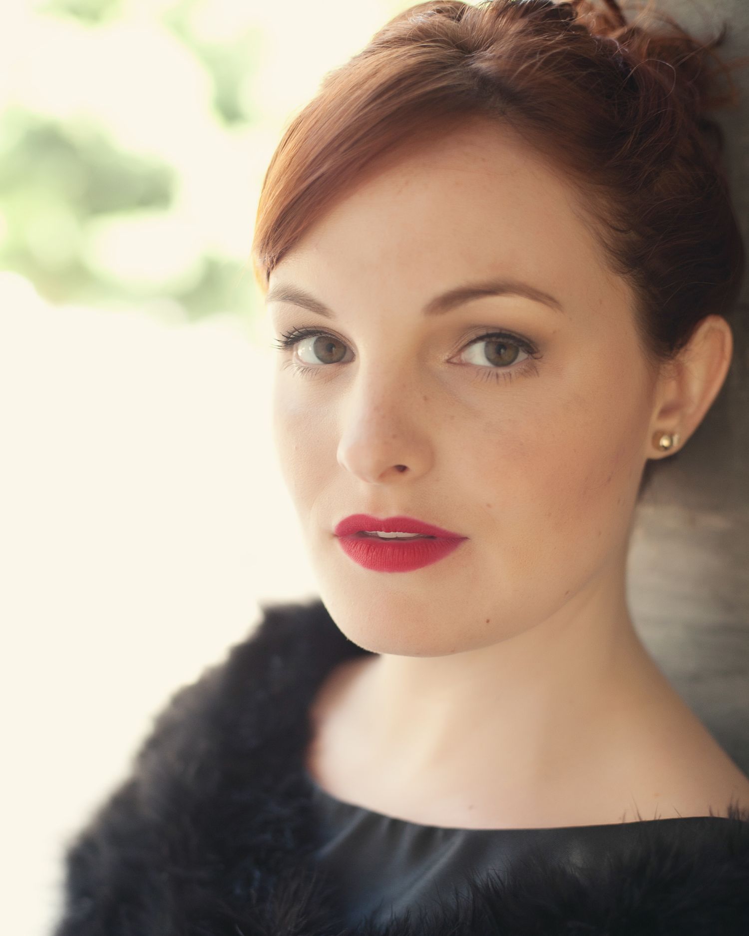 Actress or opera singer headshot in sunlit setting – lifestyle-inspired photo for casting or agency profile