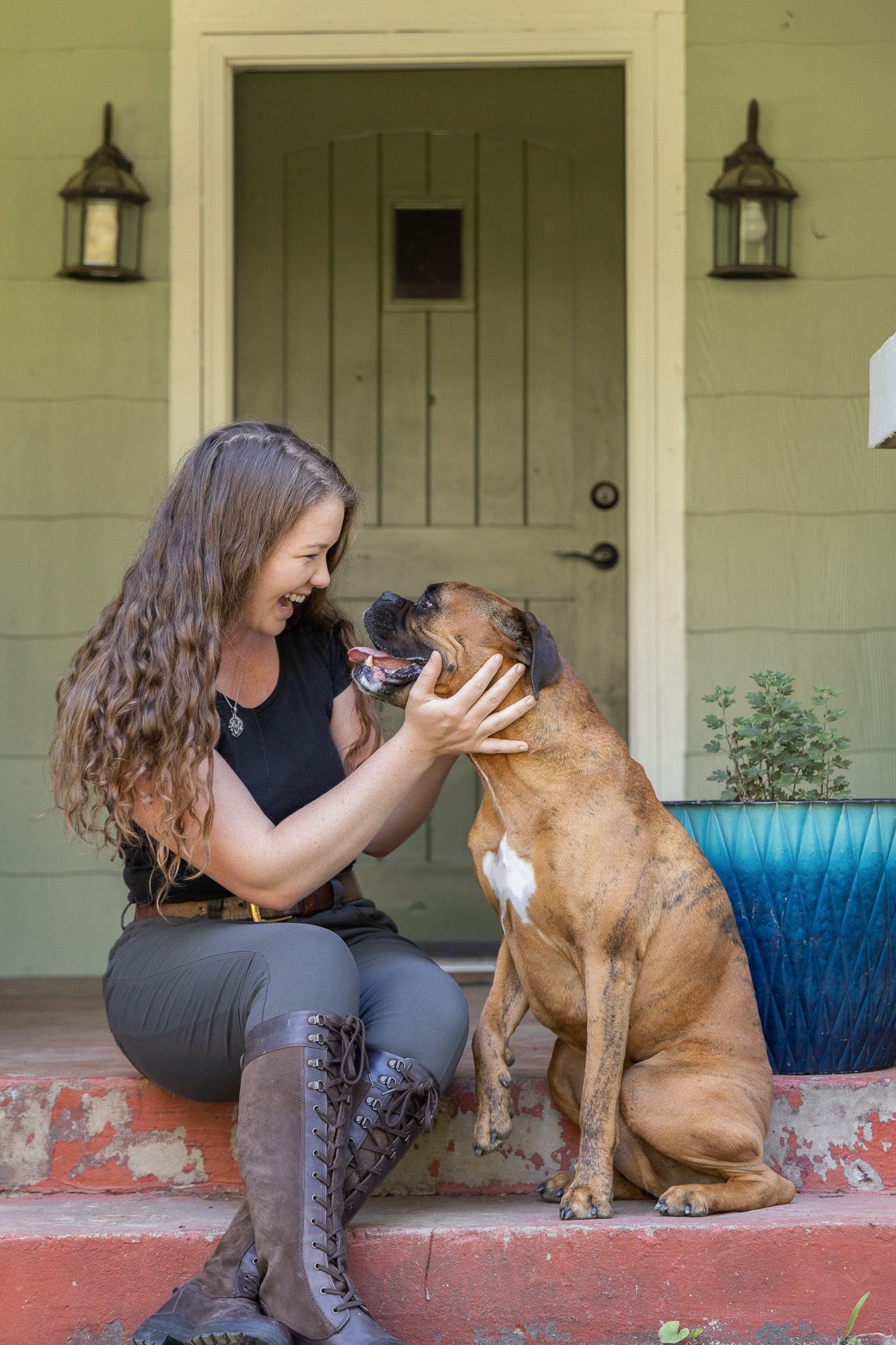 A person sits with a brown dog outdoors on a porch in a series of playful interaction shots.