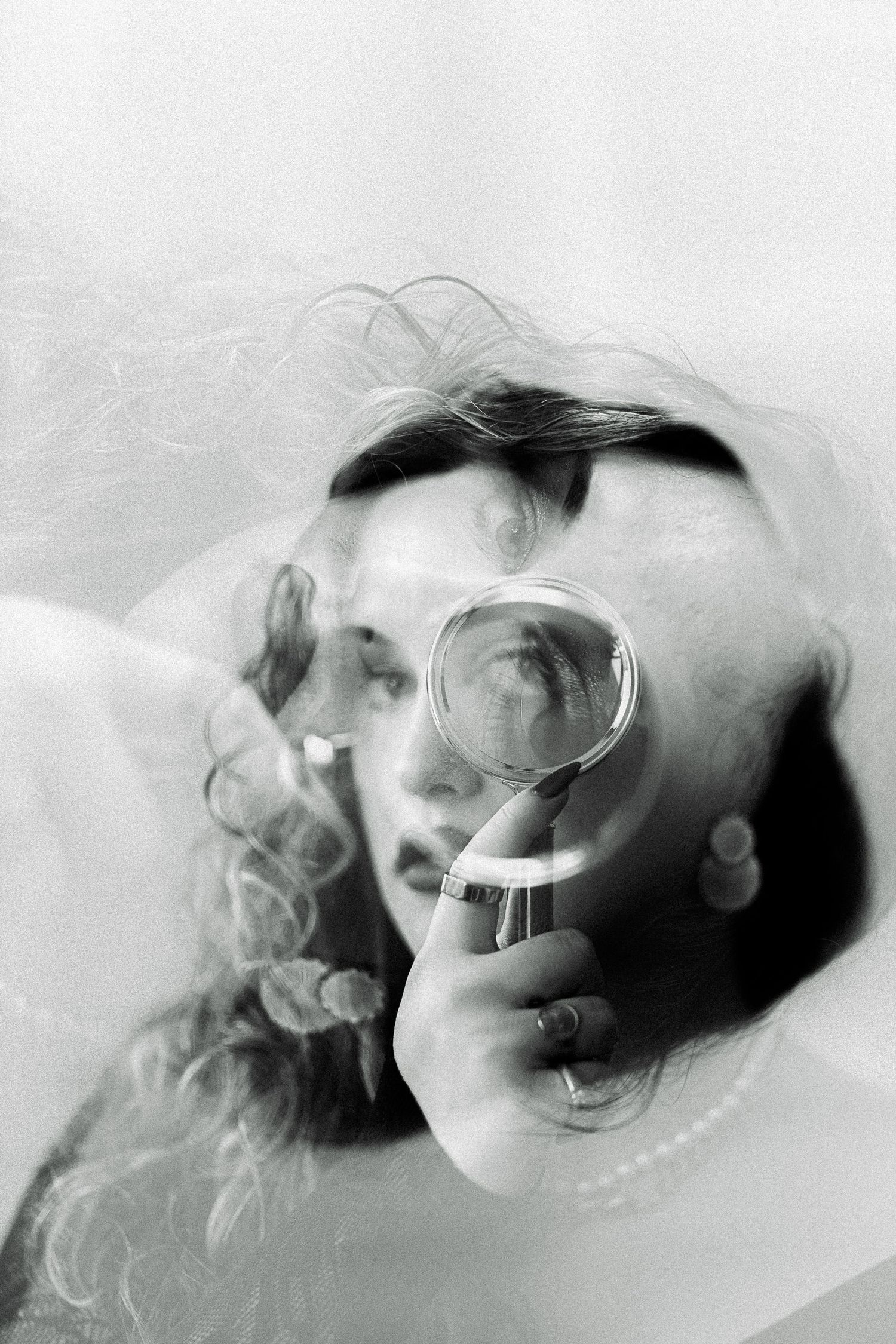 Double exposure Portrait of Jules, a transwoman exuding confidence, beauty and strength. inspired by Man Ray black and white portraits.