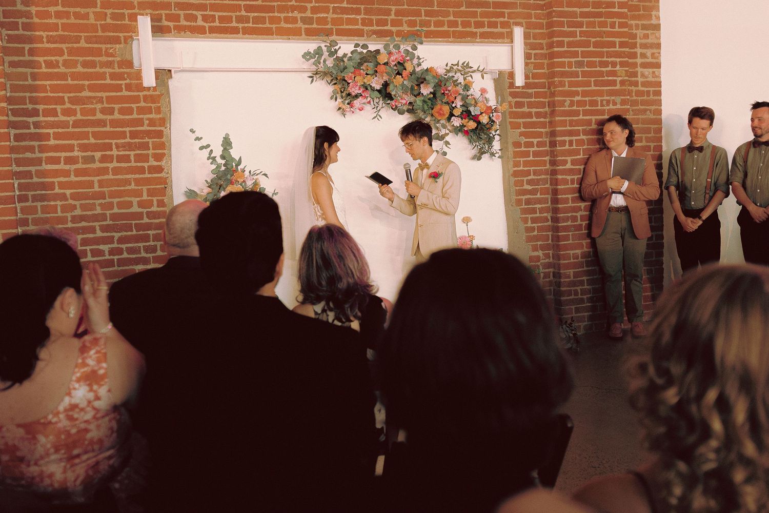 Matt and Monica’s funny, offbeat wedding at Toronto Micro Weddings with Skelly the skeleton and charcuterie boards art at the tables