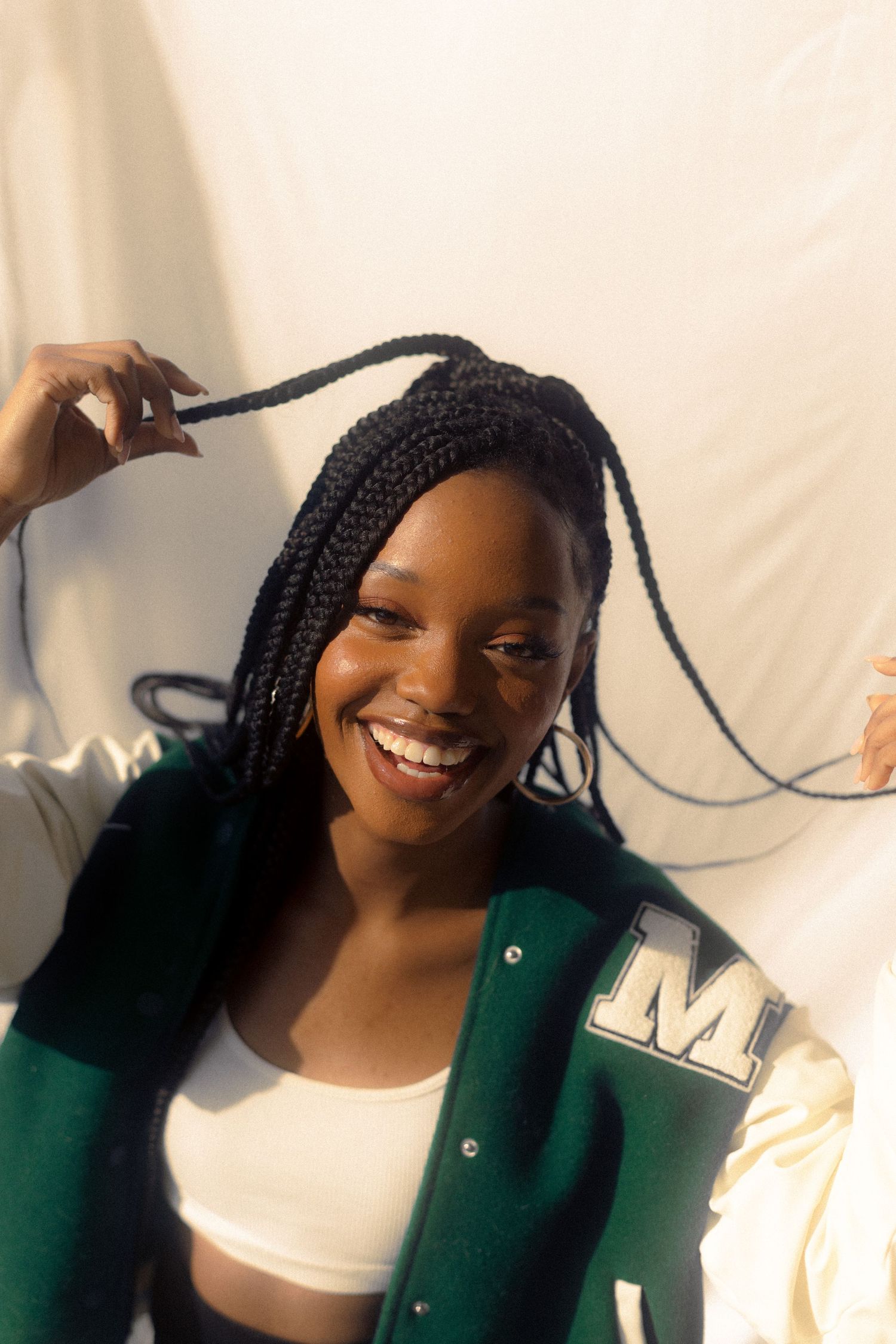 Portrait of a black woman transcending joy with her big and beautiful smile