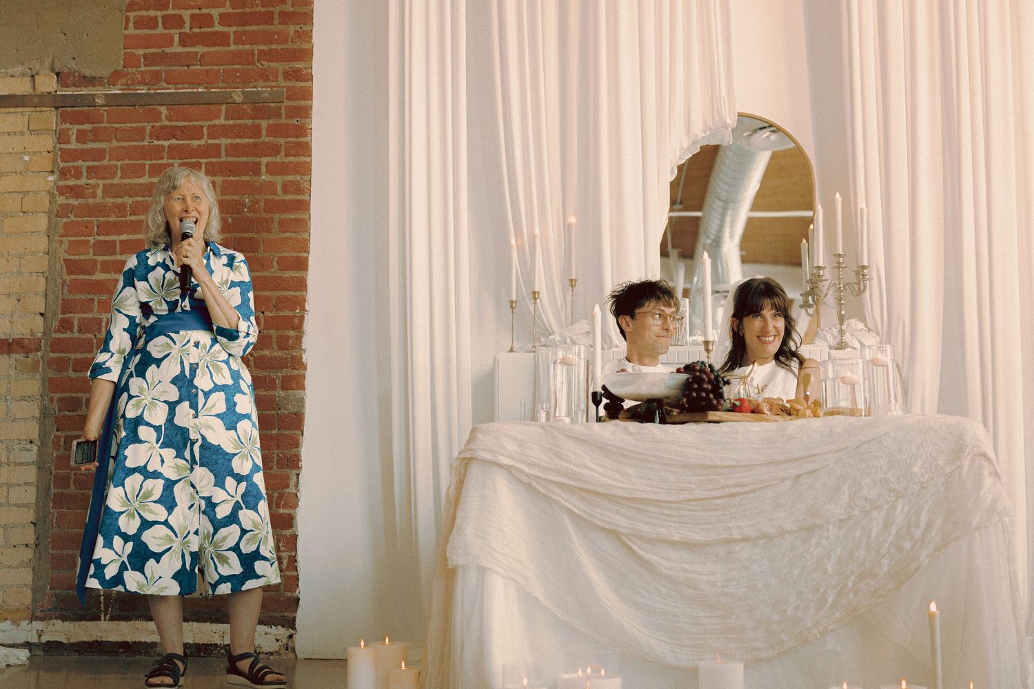 Matt and Monica’s funny, offbeat wedding at Toronto Micro Weddings with Skelly the skeleton and charcuterie boards art at the tables