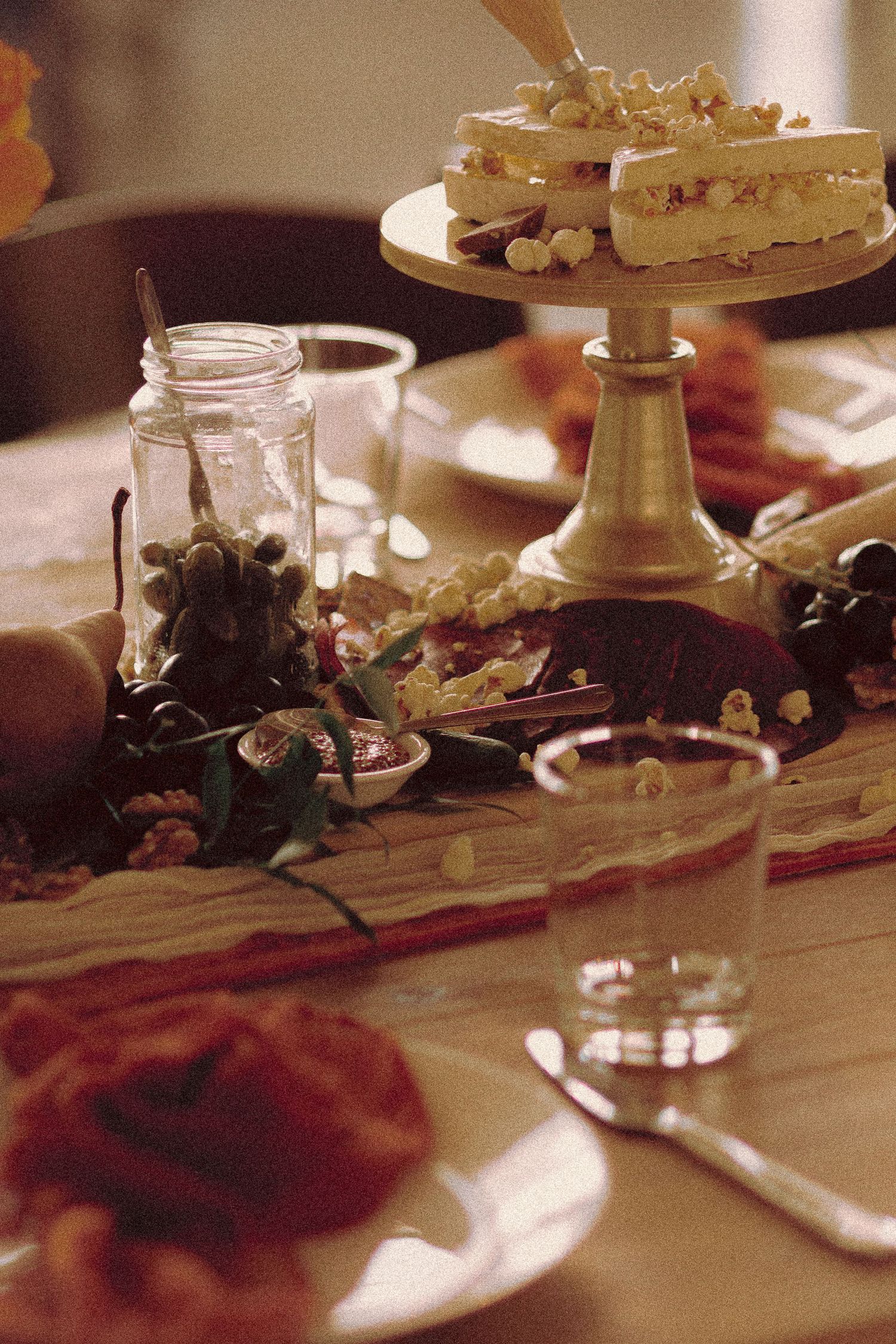 Matt and Monica’s funny, offbeat wedding at Toronto Micro Weddings with Skelly the skeleton and charcuterie boards art at the tables