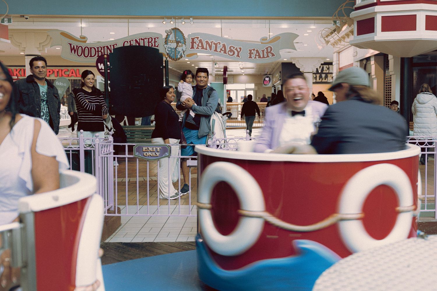 Ukranian orthodox wedding with a pit-stop at Fantasy Fair in Woodbine Mall. Intimate, theatrical with cotton-candy and vintage Photo Booth.
