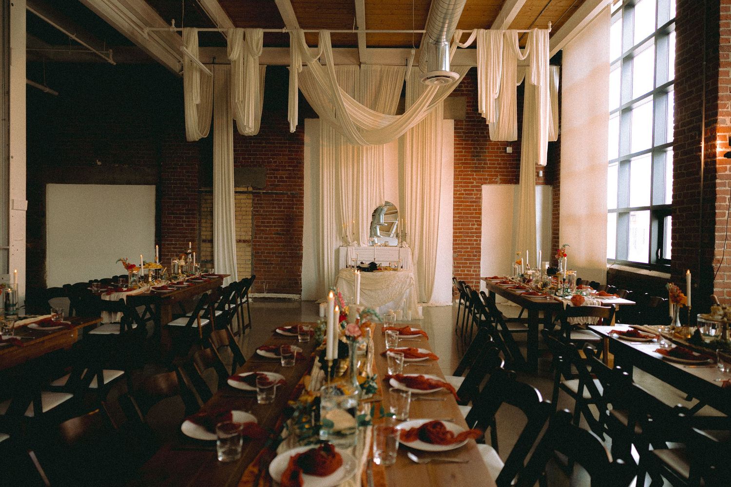 Matt and Monica’s funny, offbeat wedding at Toronto Micro Weddings with Skelly the skeleton and charcuterie boards art at the tables
