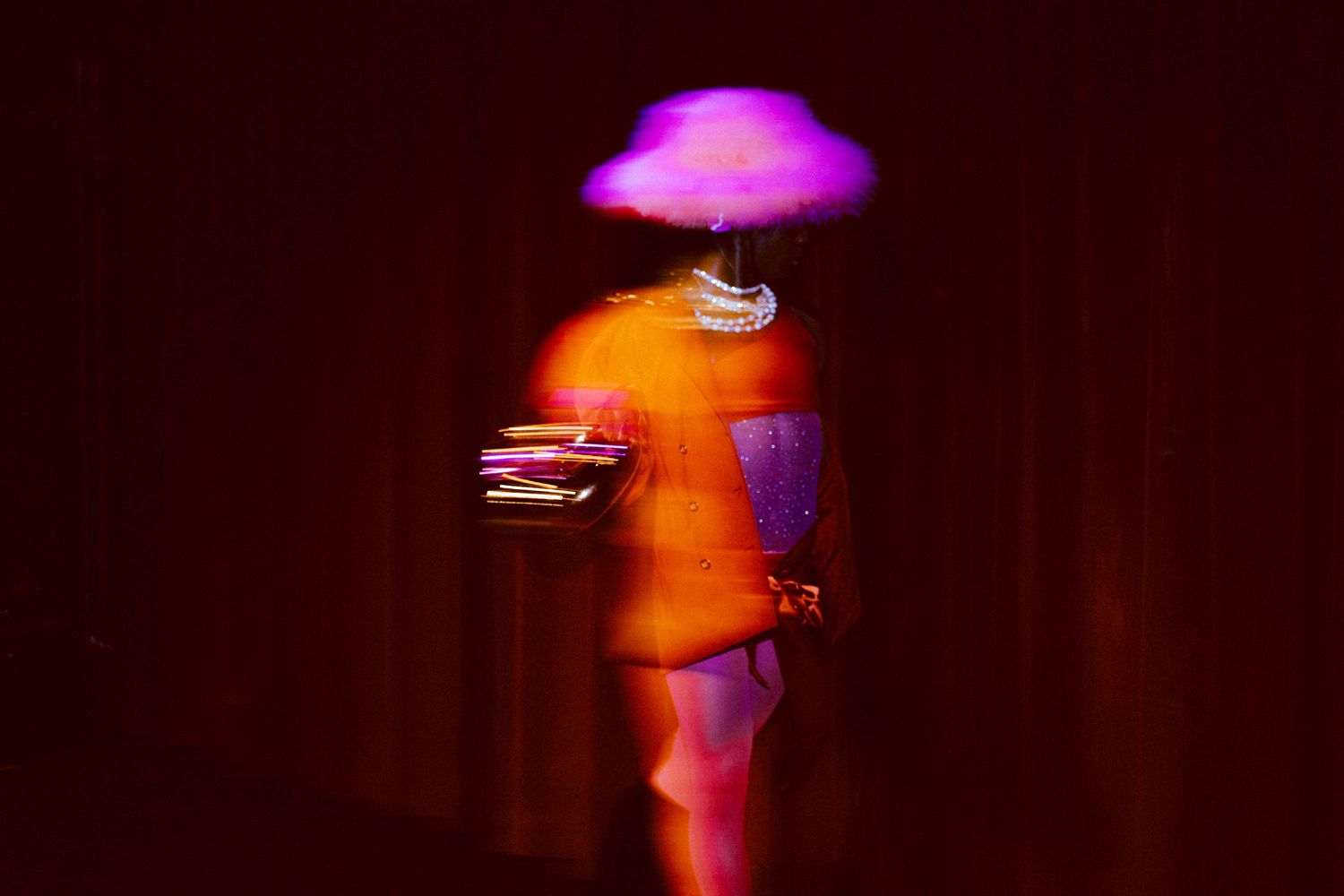 Max Delroy wearing orange and pink at BUDDIES IN BAD TIMES during BI BI BABY event organized by Something Co
