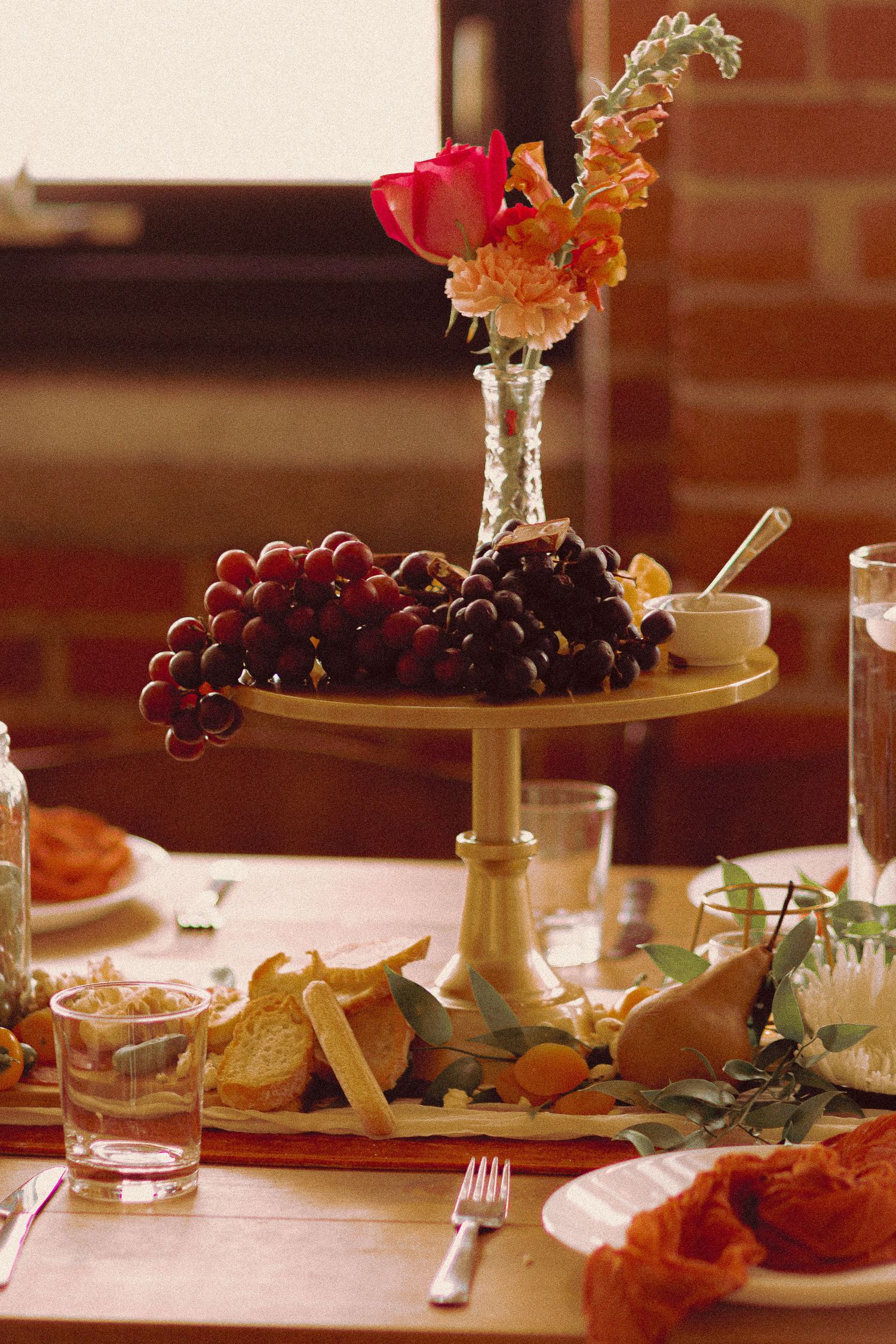 Matt and Monica’s funny, offbeat wedding at Toronto Micro Weddings with Skelly the skeleton and charcuterie boards art at the tables