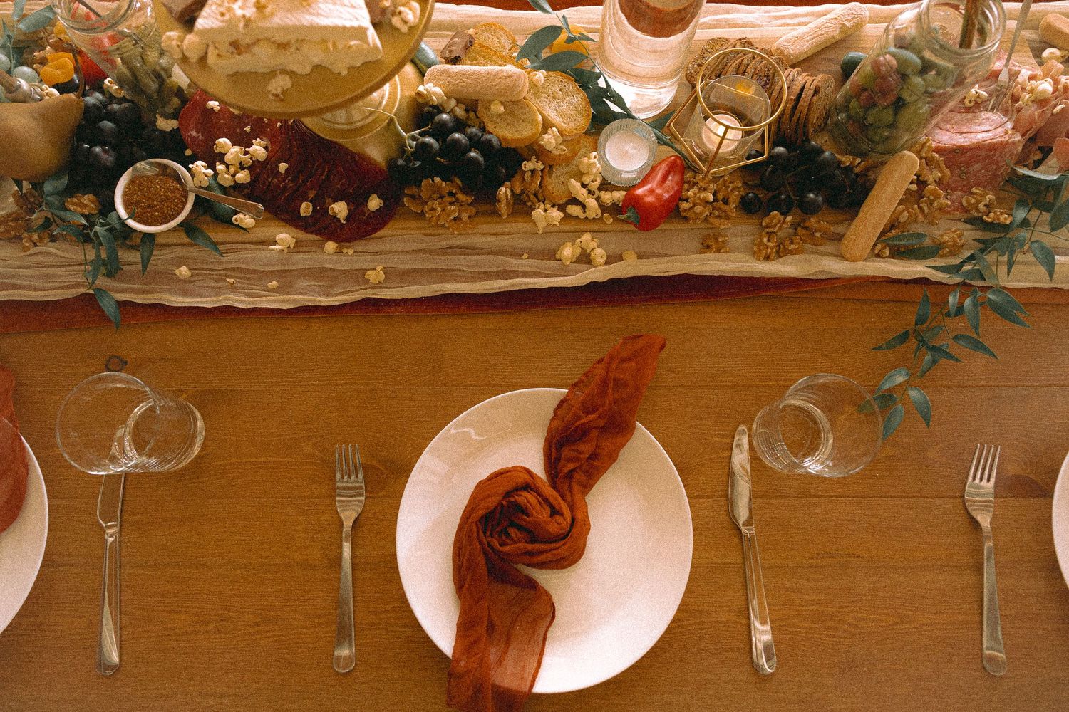 Matt and Monica’s funny, offbeat wedding at Toronto Micro Weddings with Skelly the skeleton and charcuterie boards art at the tables