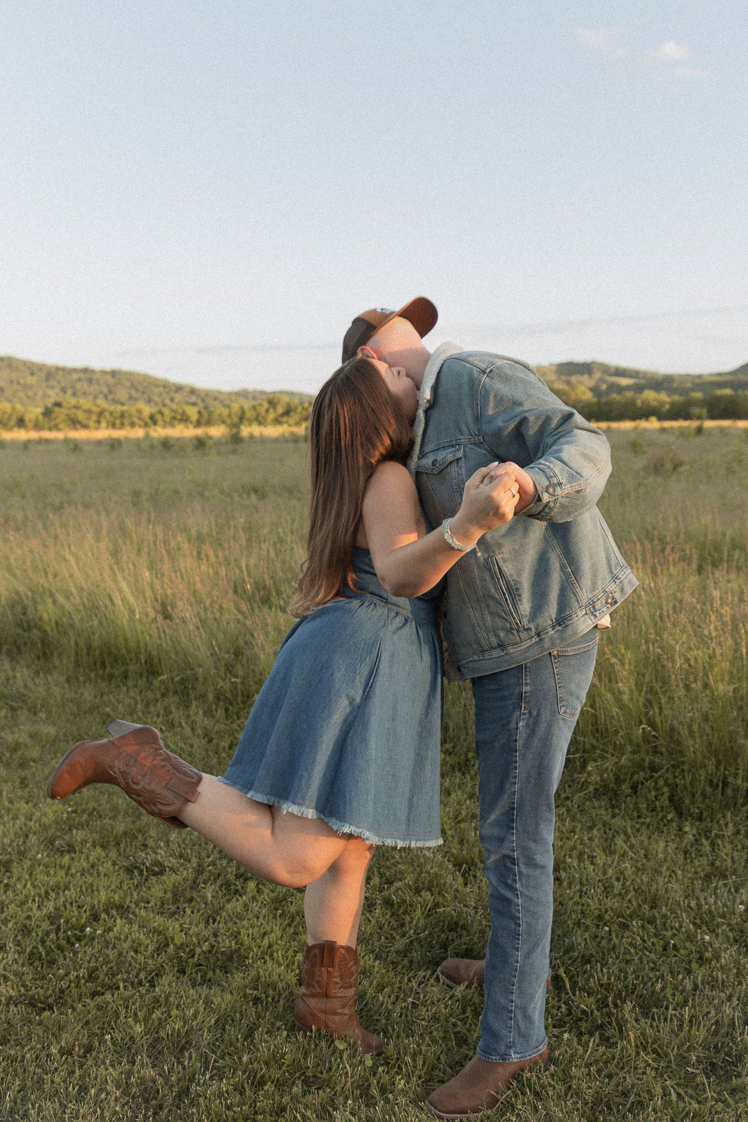 Ohio wedding photographer - Adeva Rae Photography - CoupleOhio wedding photographer - Adeva Rae Photog in field with hills - western attire.