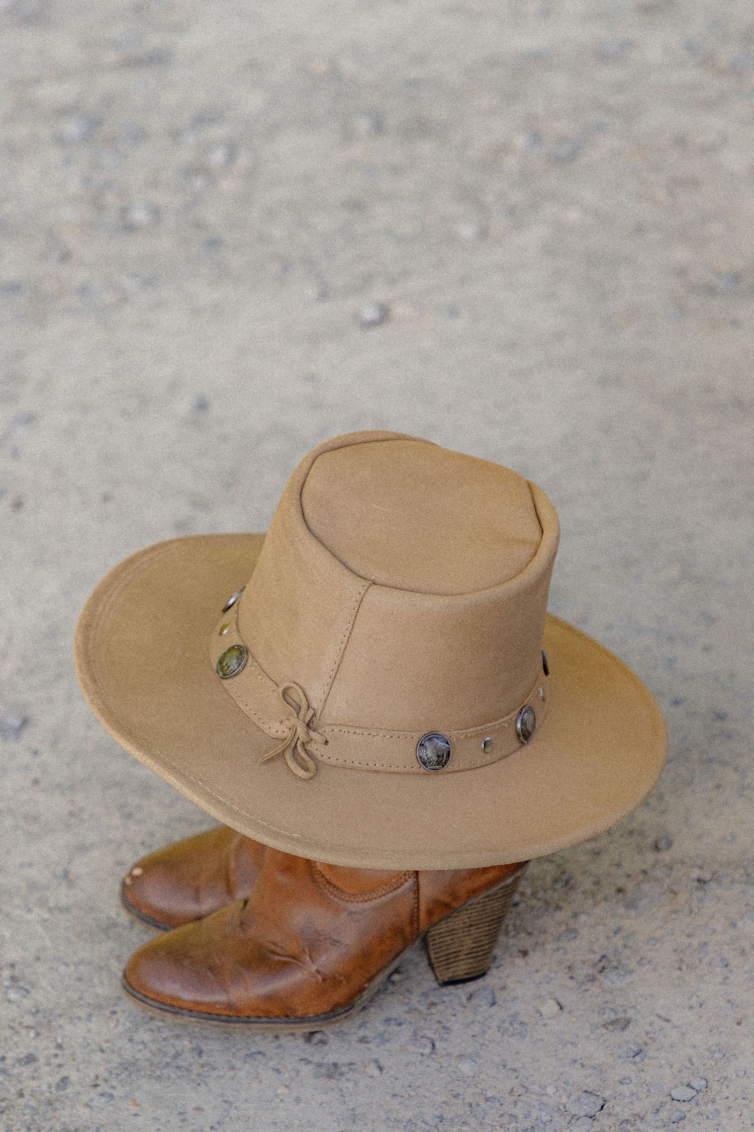 Ohio wedding photographer - Adeva Rae Photography - Couple in field with hills - western attire.