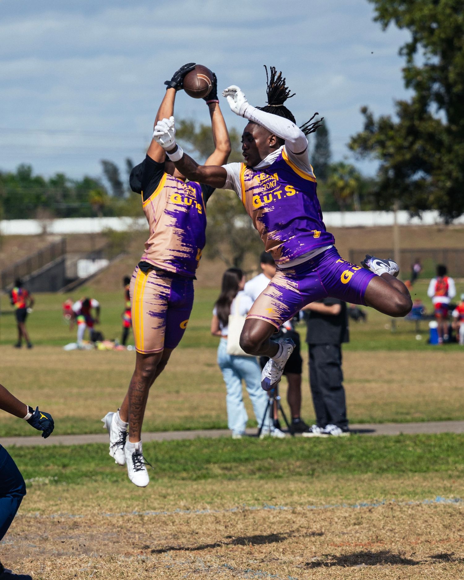 Interception by defensive player during the 2025 Lamar Jackson 7v7 game in South Florida. Fort Lauderdale sports photographer