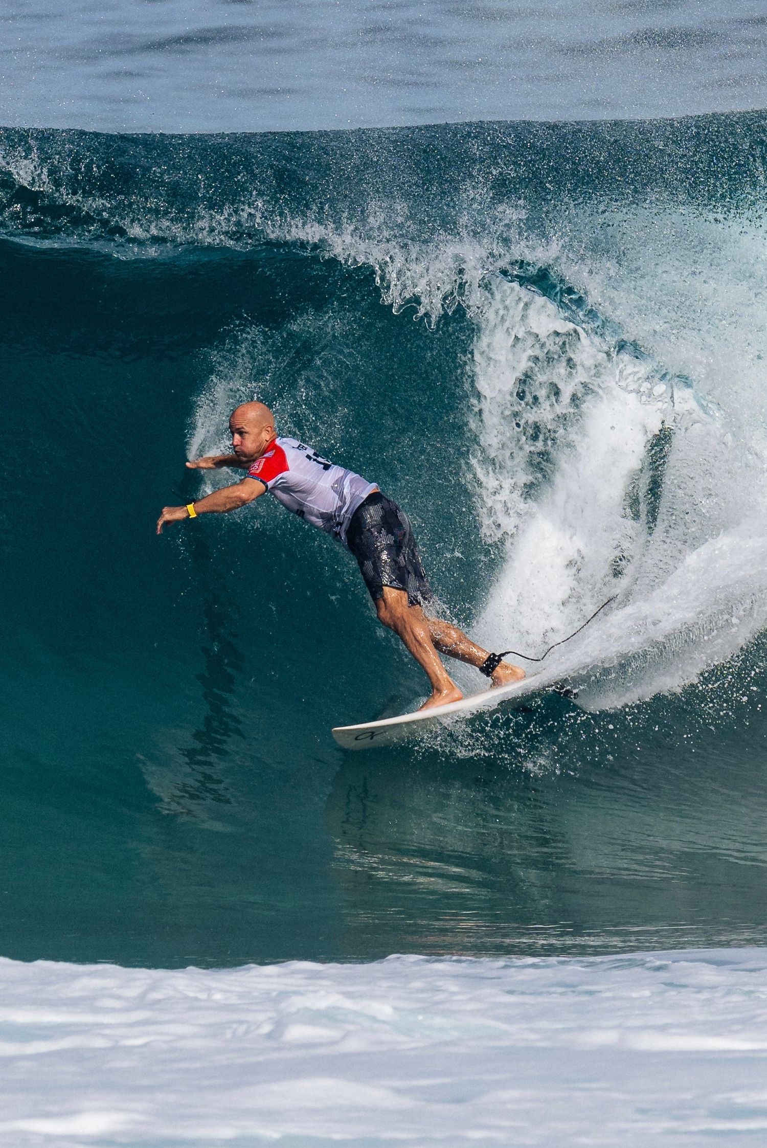 Kelly Slater during the 2025 Pipe Pro event at Pipeline beach on the North Shore of Oahu, Hawaii. Sports Photographer James Ferriero