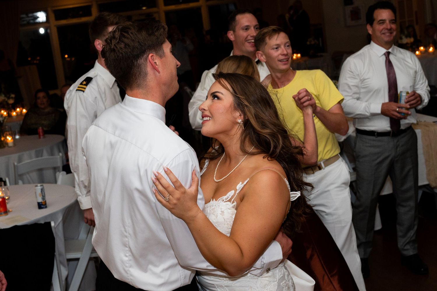 Joyful moment on the dance floor during a wedding reception.