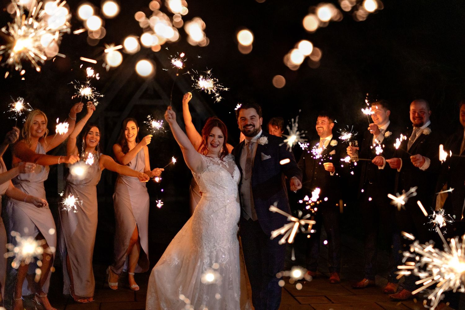 Couple photos outside sparklers