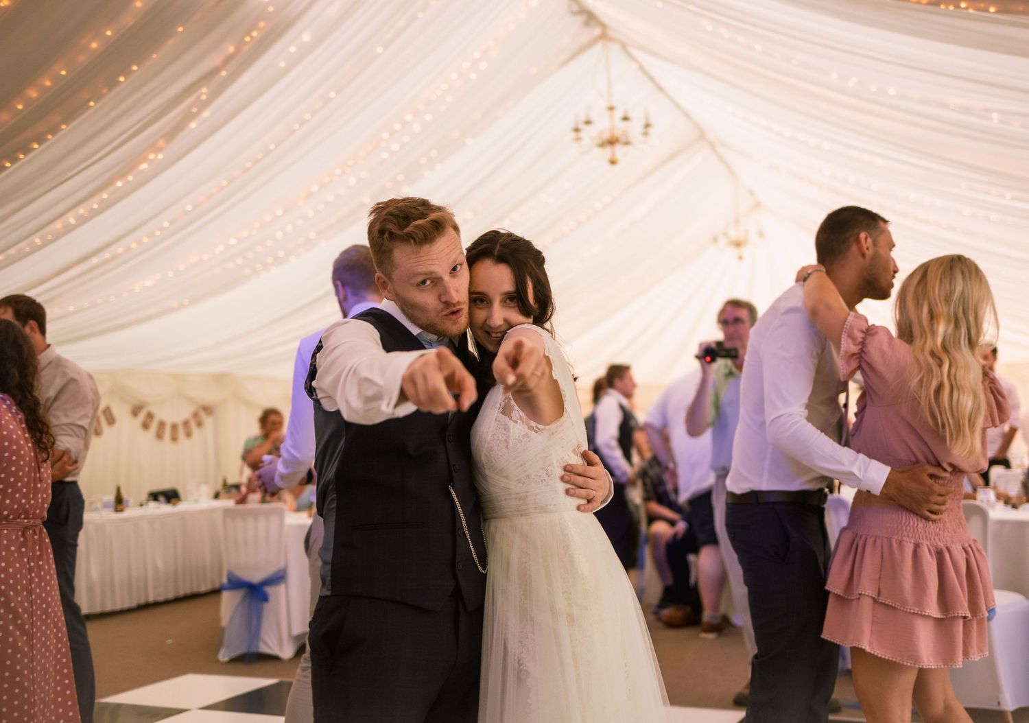 bride and groom dancing marquee venue