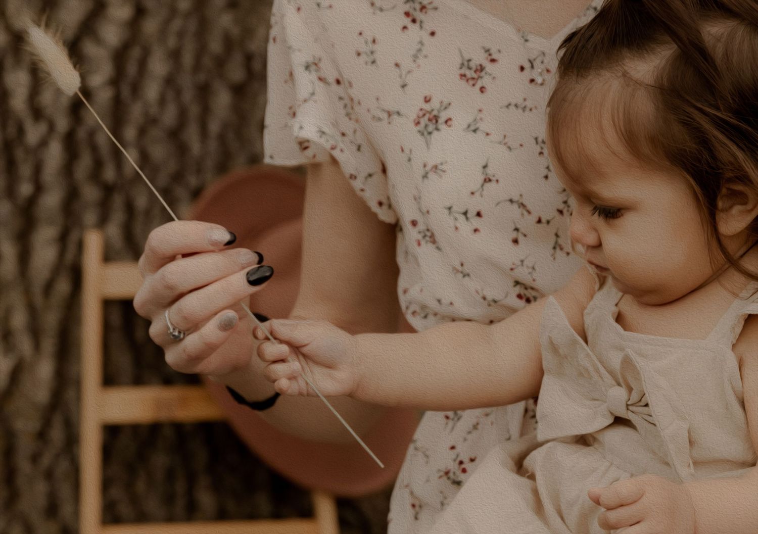 Small hands grasping at strings with careful concentration in a warm-toned setting.