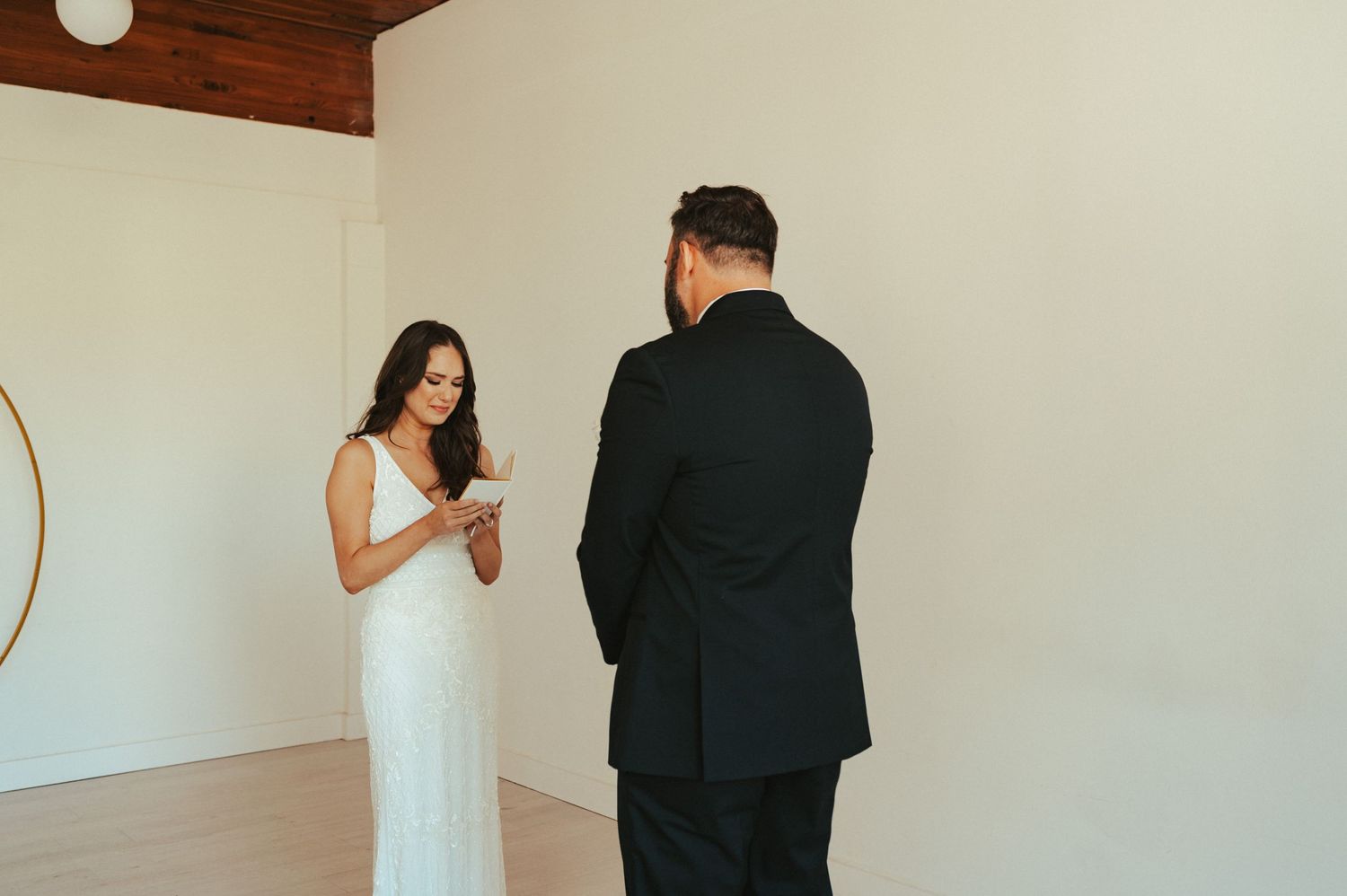 A couple shares emotional vows during their private first look before the ceremony.
