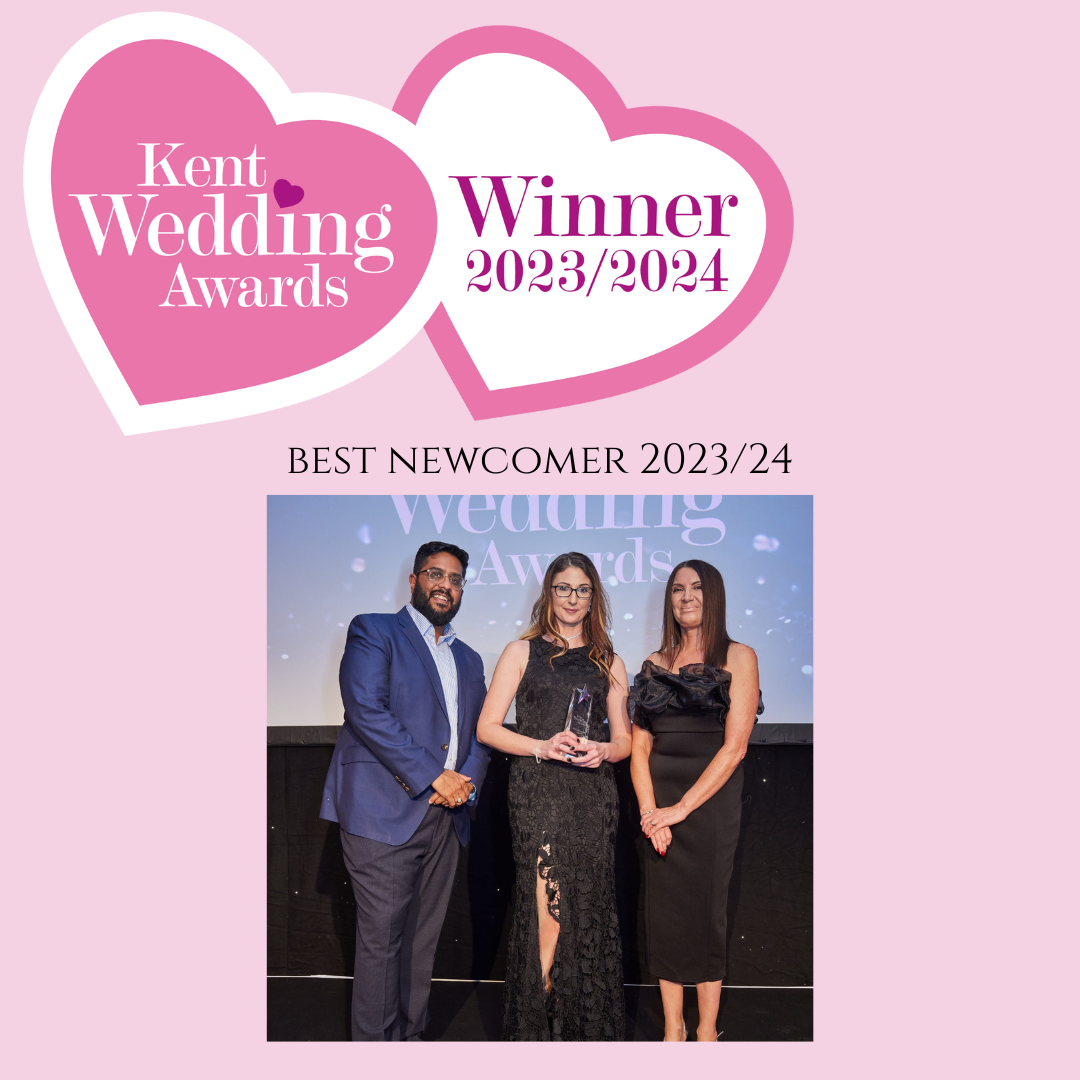 Wedding industry award ceremony winners receiving a best newcomer trophy on pink background.