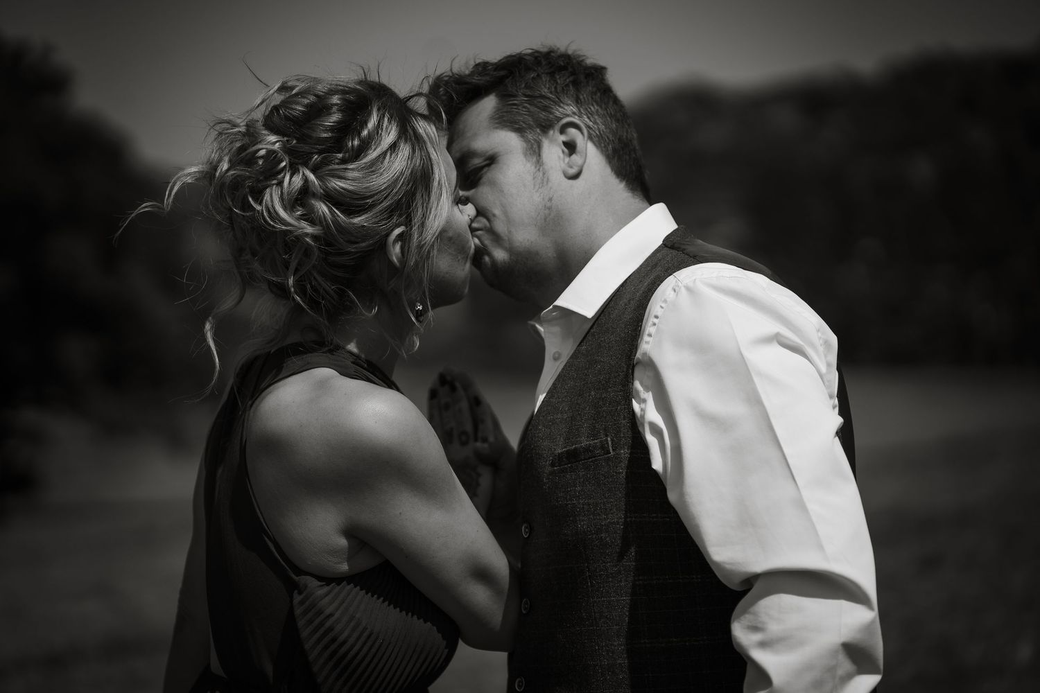 Black and white romantic portraits showing tender intimate moments.