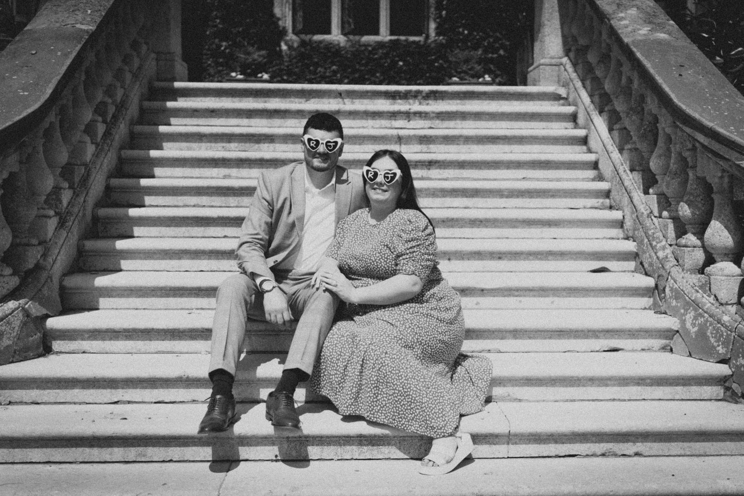 Black and white series of tender moments captured on grand stone steps.