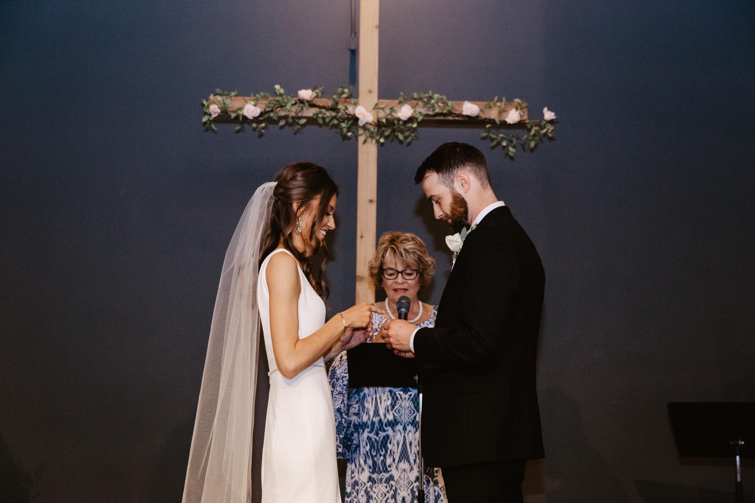 wedding ceremony in lincoln nebraska church, ring exchange in a wedding ceremony in lincoln nebraska