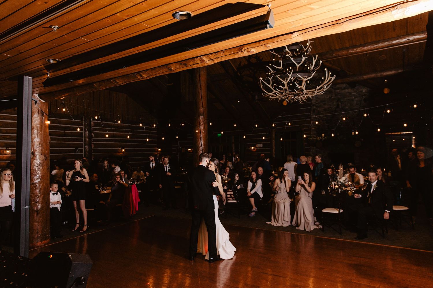 bride and groom first dance at the wilderness ridge wedding venue in lincoln nebraska