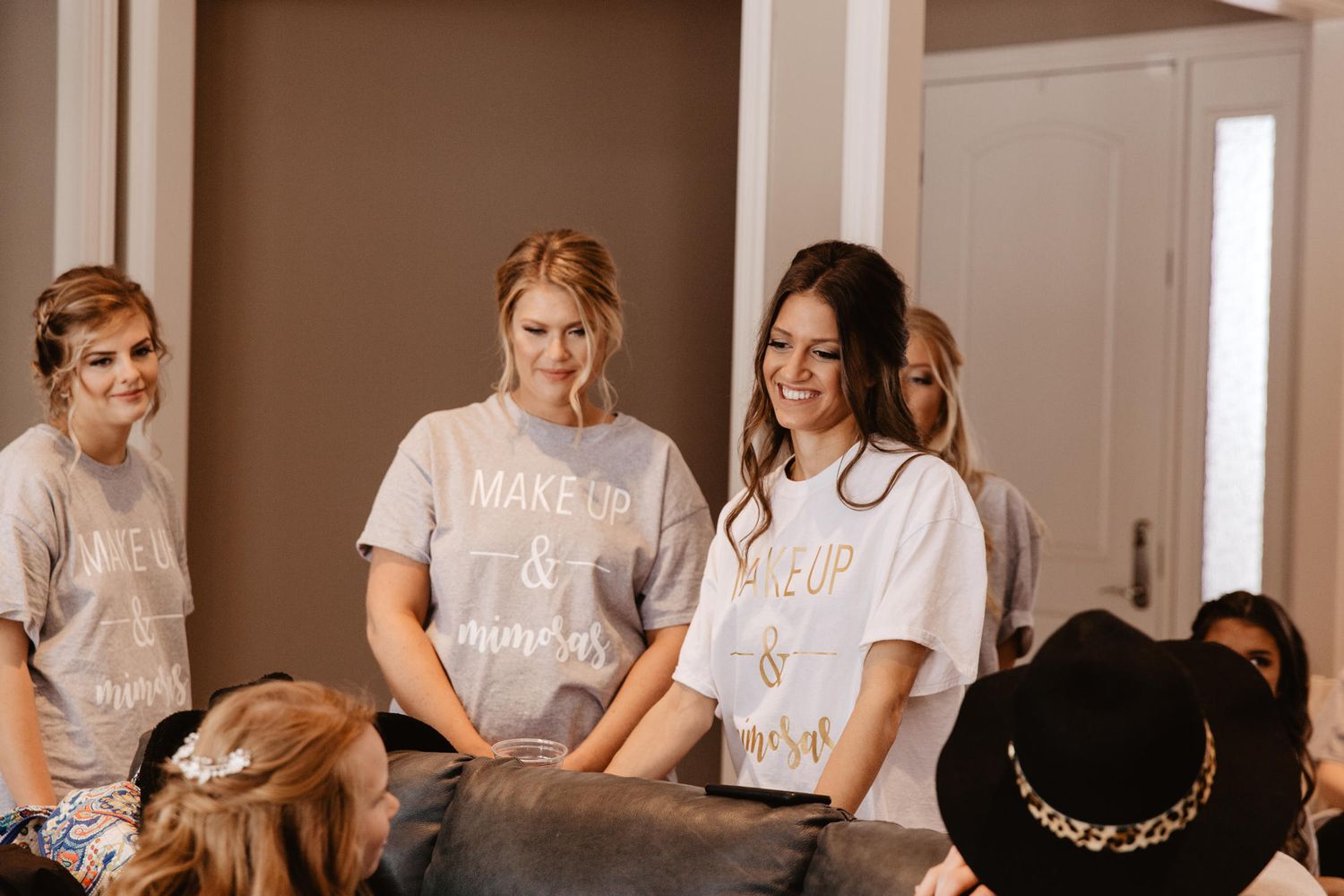 bride with her bridesmaids the morning of her wedding day, lincoln ne wedding photographers