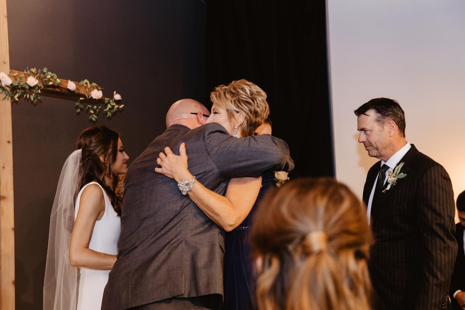 parents congratulating newlyweds