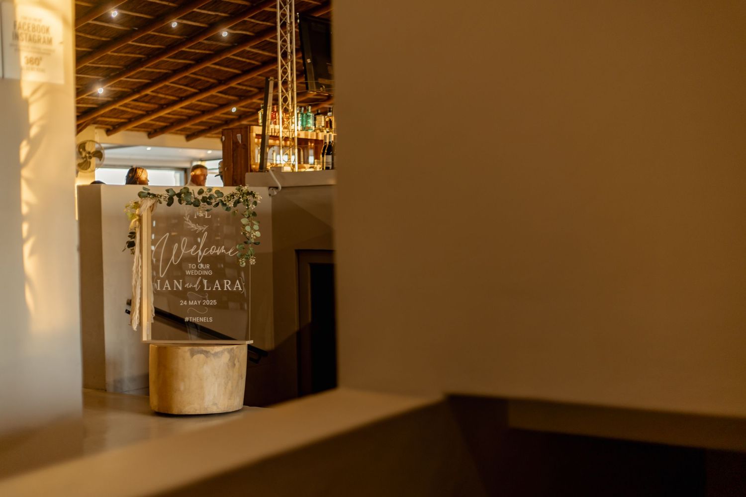 A vintage glass mason jar sits on a wooden shelf with soft sunlight filtering through, creating a warm ambiance.