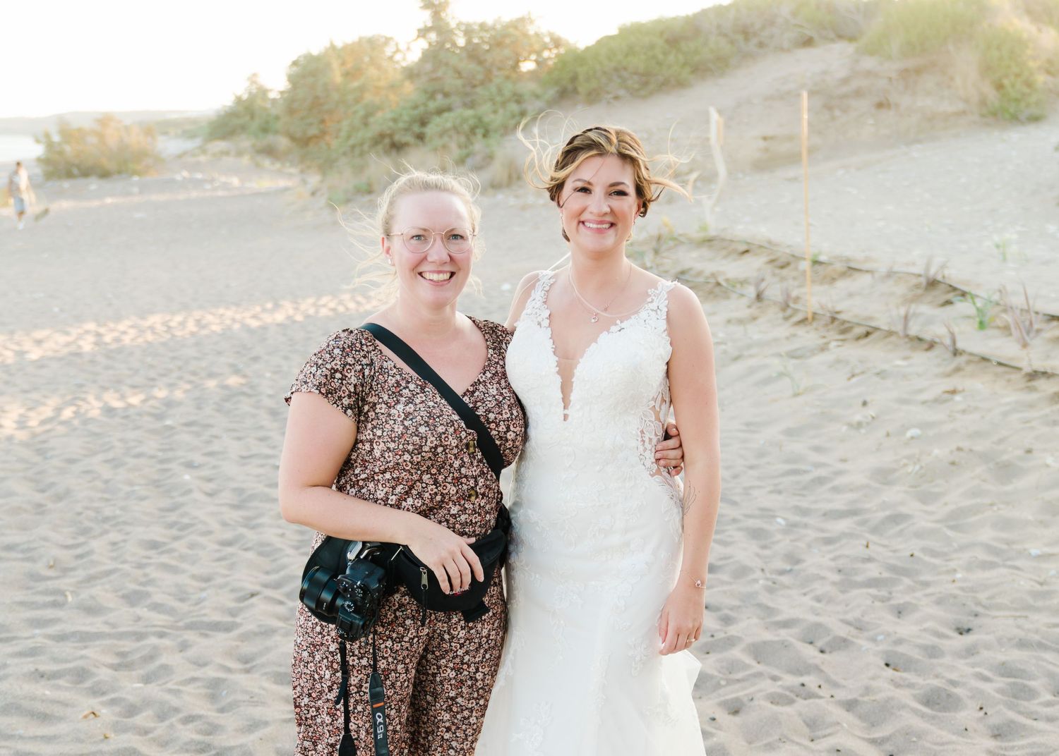 Two people pose together on beach at sunset during wedding celebration.heiraten am Strand - Hochzeitsfotograf Rhodos Tina Lucius