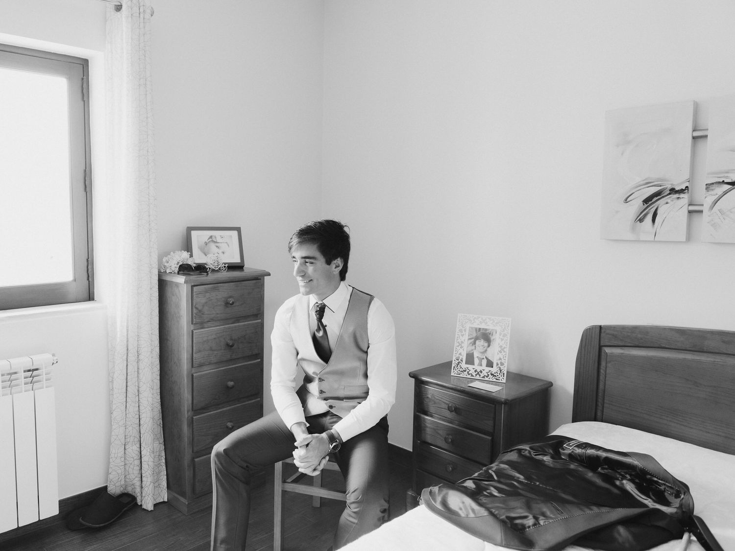 A sequence of black and white photographs showing someone sitting in what appears to be a bedroom talking on a phone.