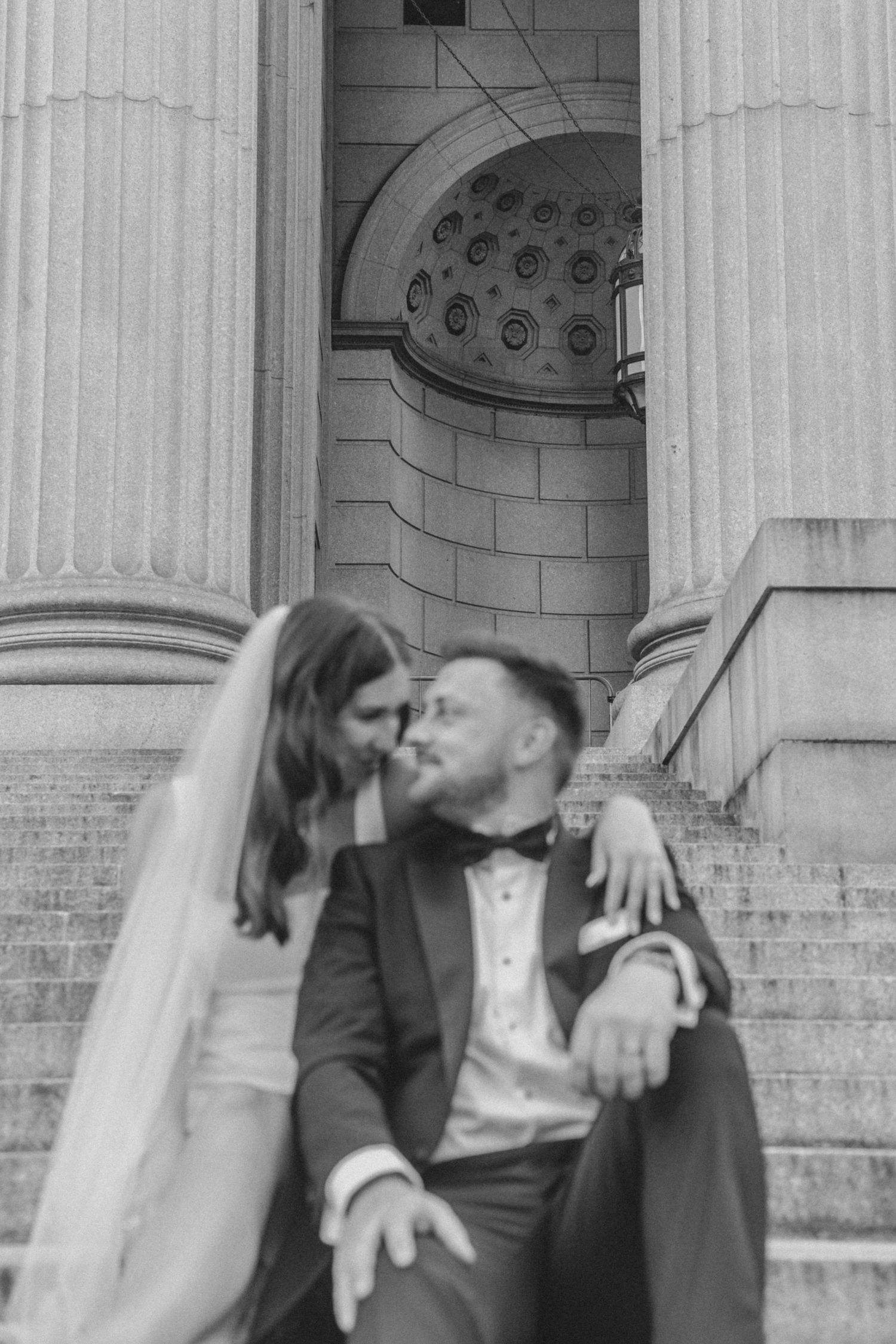 Candid moment of bride and groom on their NYC elopement day