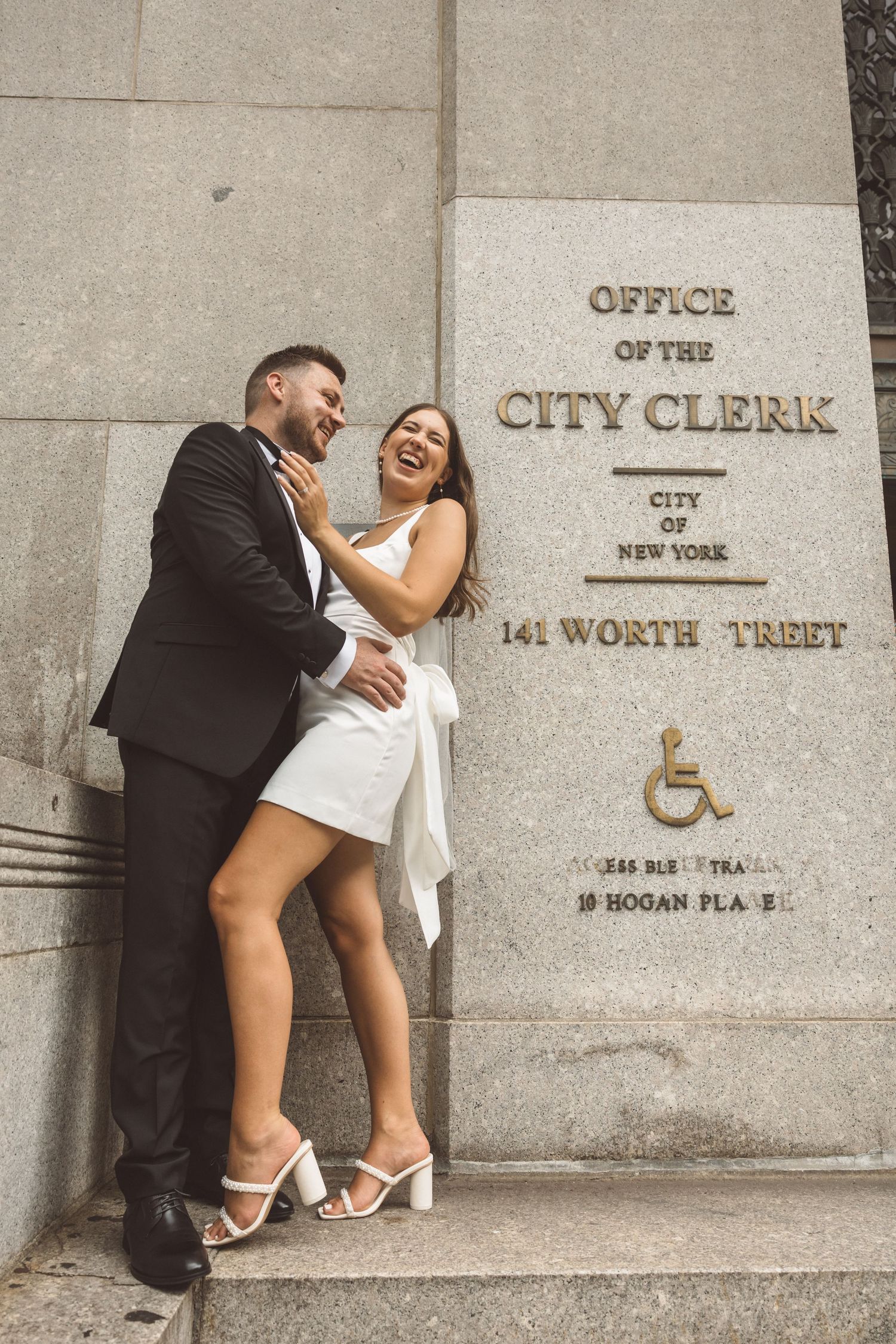 UK couple celebrating marriage at the office of the city clerk in NYC