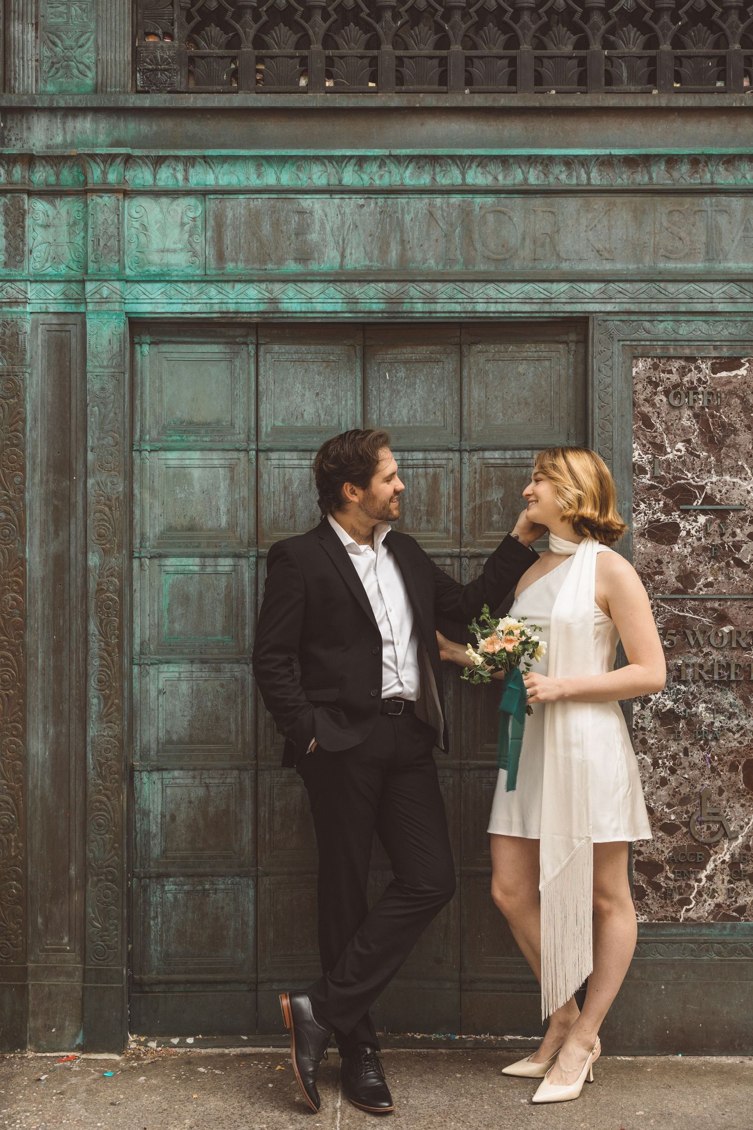 Candid moment of couple during City Hall wedding in downtown Manhattan