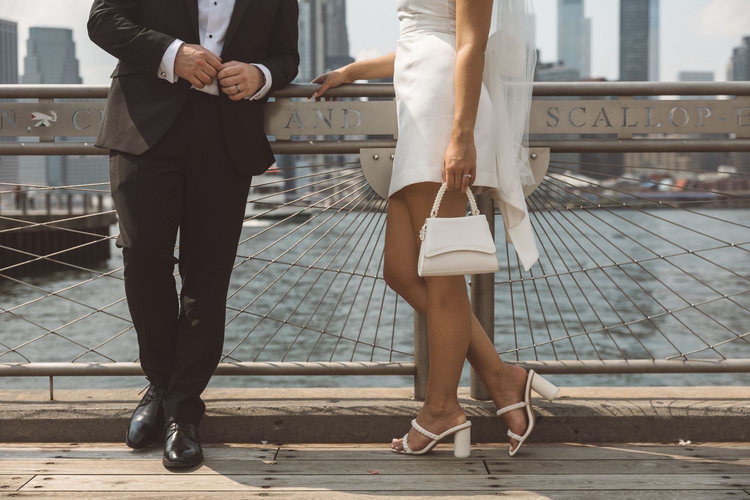 City Hall wedding day photo with couple in front of New York City skyline