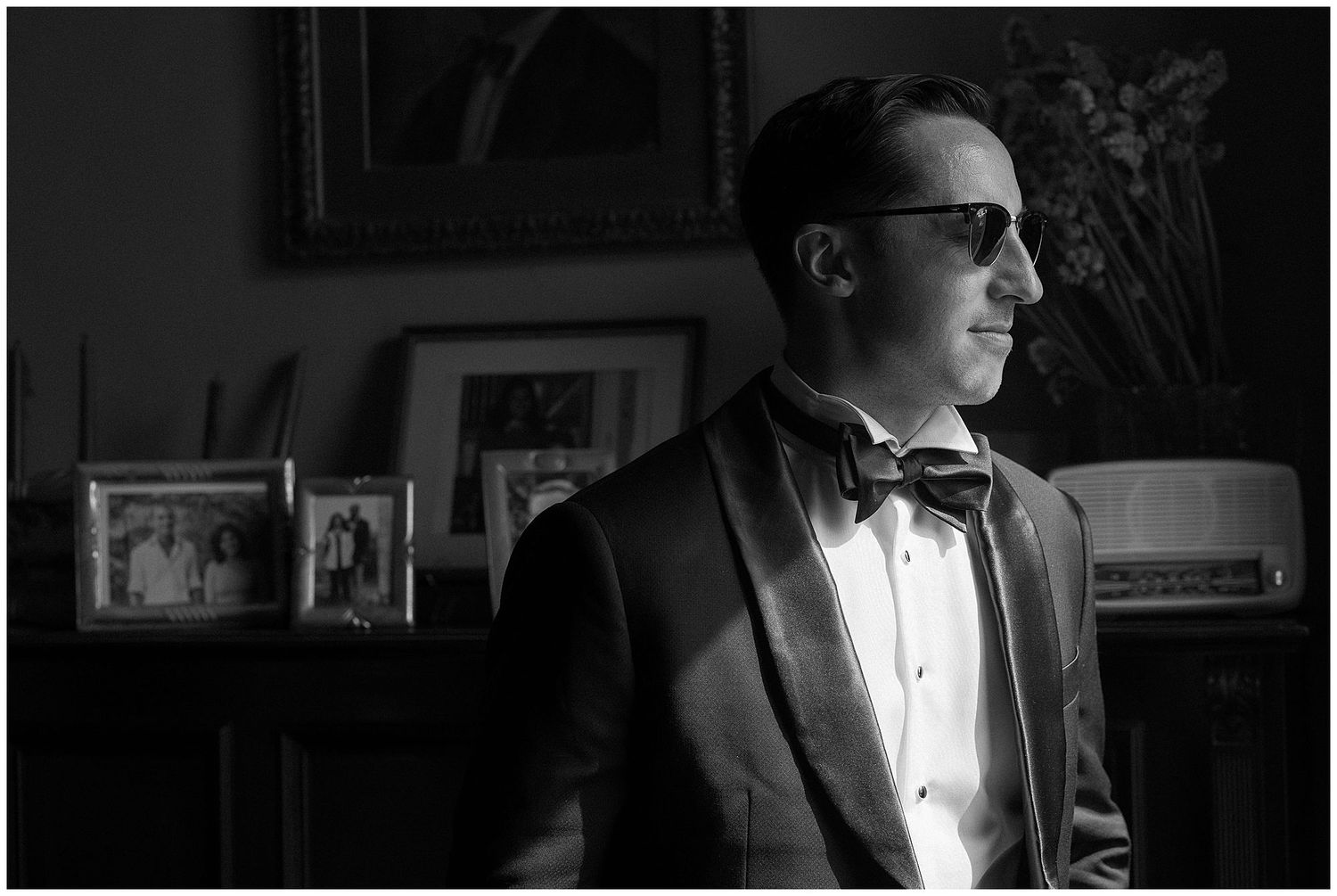 A series of black and white photos showing a person in formal attire looking away in a moody, cinematic style.