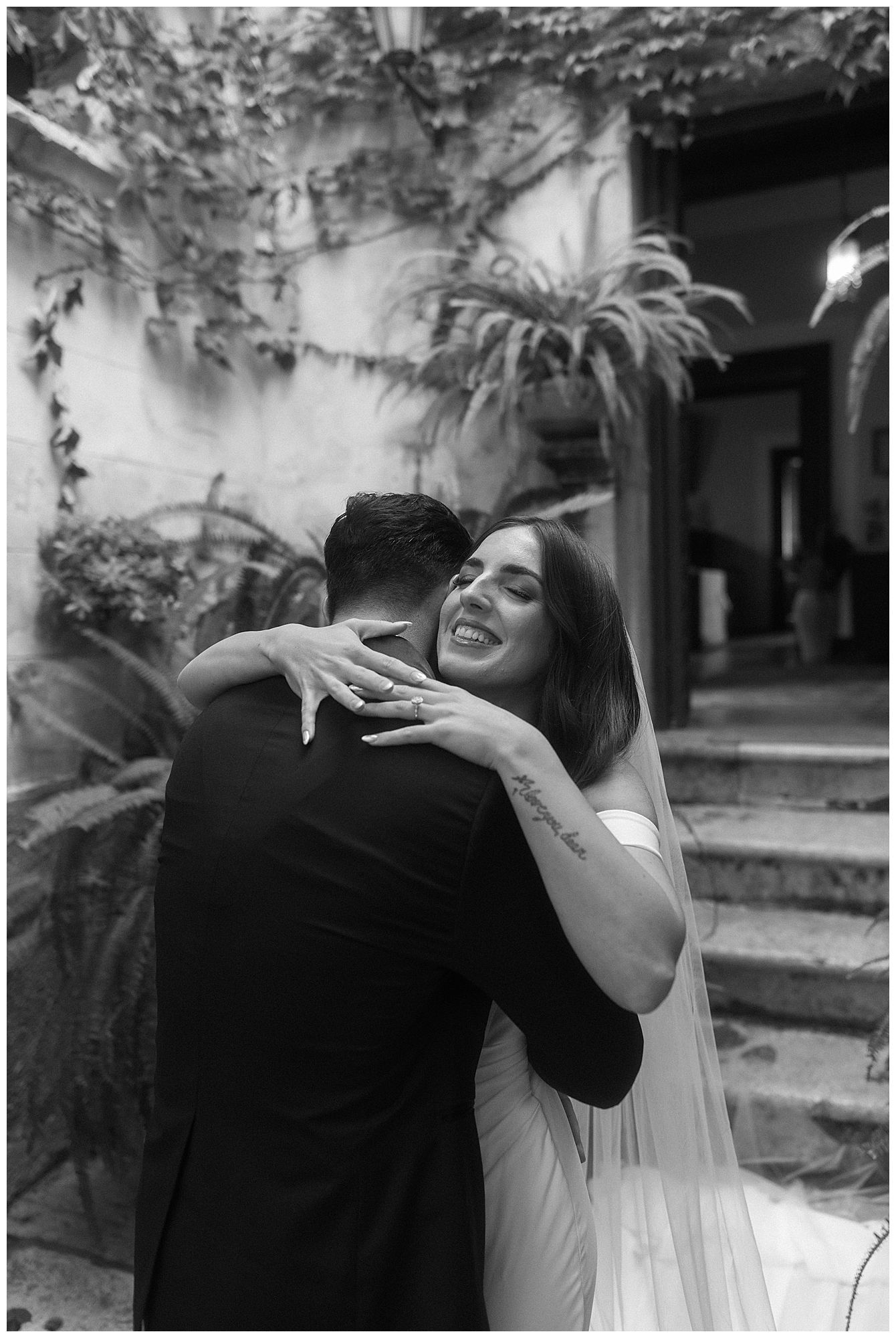 A series of black and white wedding photos showing a couple in joyful, playful and candid moments together.