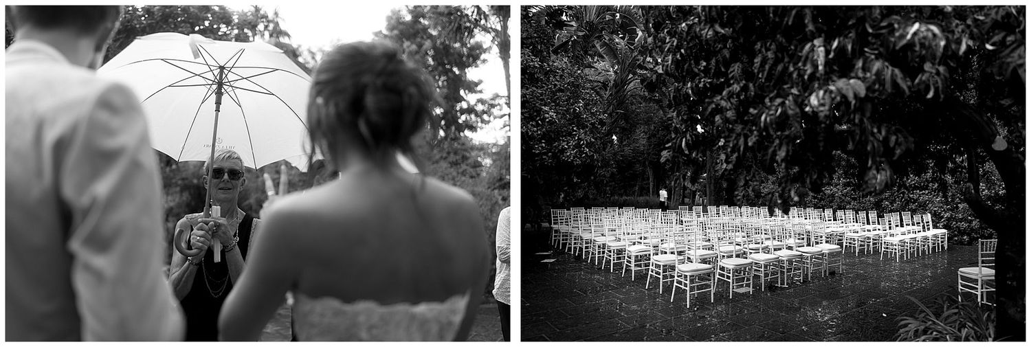 Elegant outdoor wedding ceremony setup with white chairs arranged in rows under tall trees at twilight.