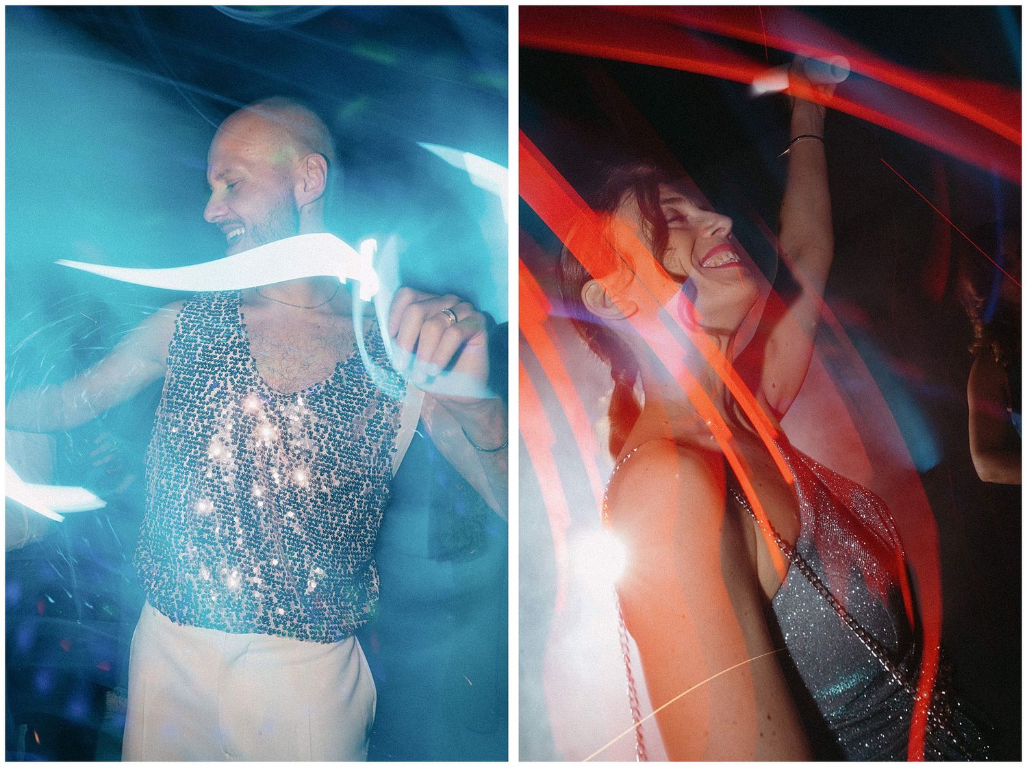 Two dancers in sequined outfits performing under dramatic blue and red lighting.
