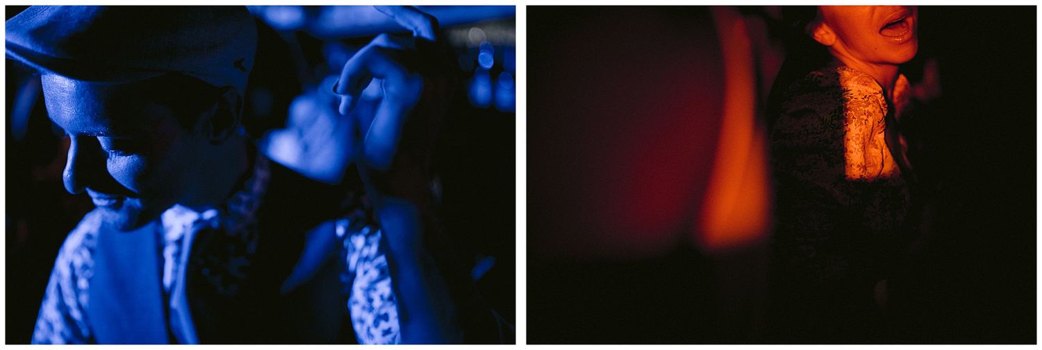 Concert stage setup with intense blue and red lighting creating a dramatic atmosphere.
