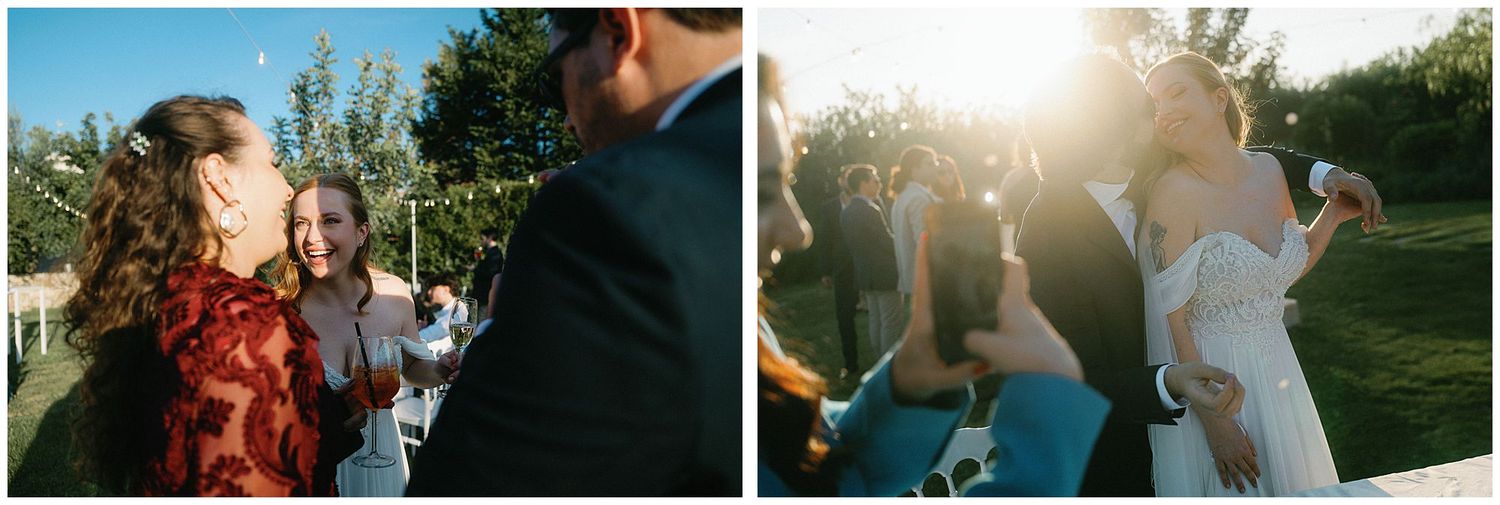 Lively outdoor celebration with people dancing and embracing in golden sunlight during sunset.