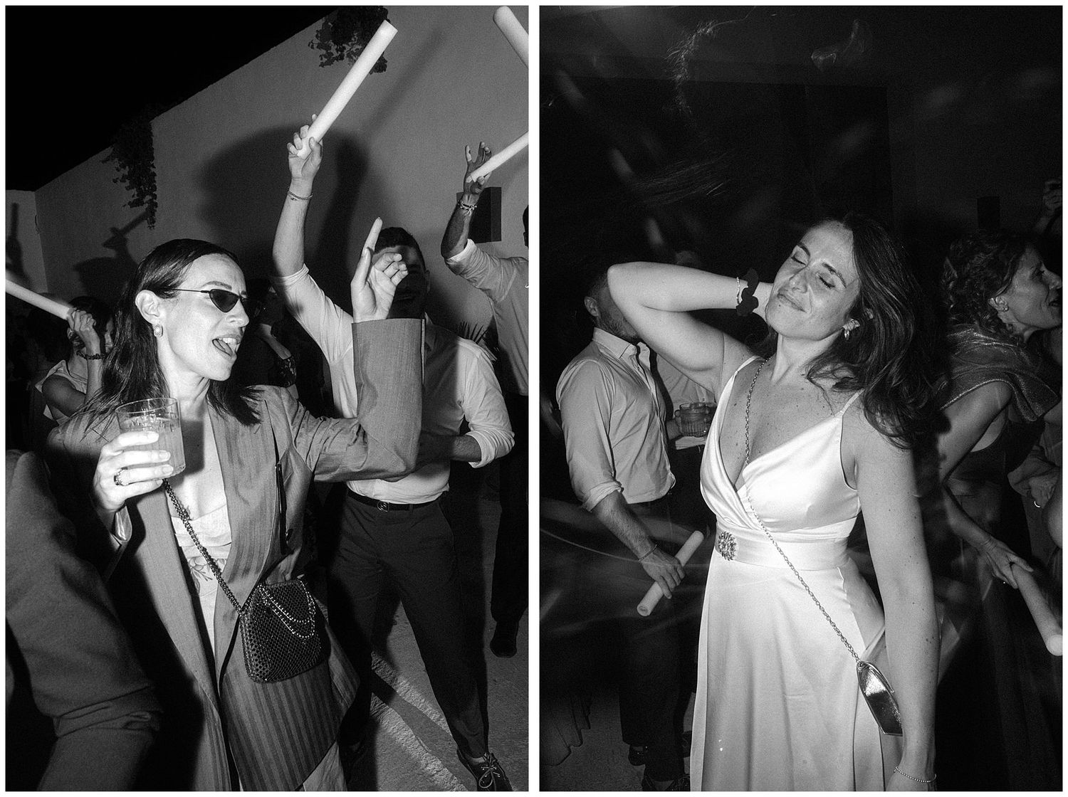Party-goers dancing energetically at a black and white event with festive atmosphere.