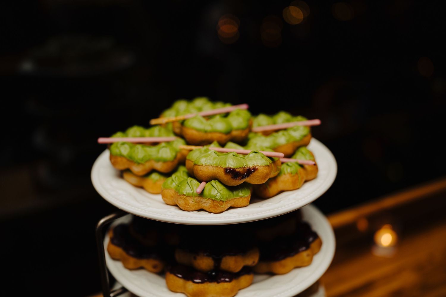Tiered plate of colorful appetizers or hors d'oeuvres at wedding reception.